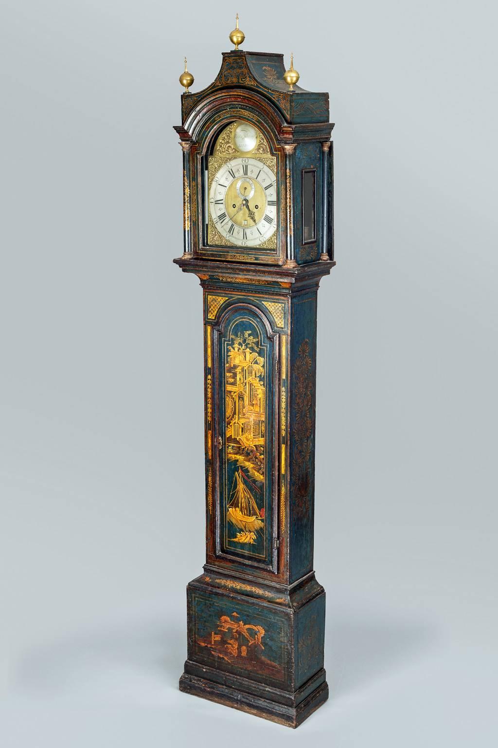George II blue lacquered tall case clock inscribed Wm. Stapleton, London. It has an eight-day movement with twin train and anchor escapement, striking on a bell, brass dial with silvered chapter ring and Roman chapters, seconds dial and date