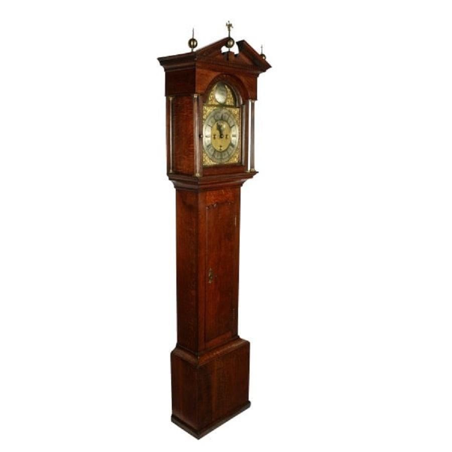 An early 18th century George II Scottish oak cased grandfather clock by Andrew Dickie.

The clock dial is brass with a silverised chapter ring and a circular name disc 'Andrew Dickie Sterling', registered as a clock maker between 1723 to