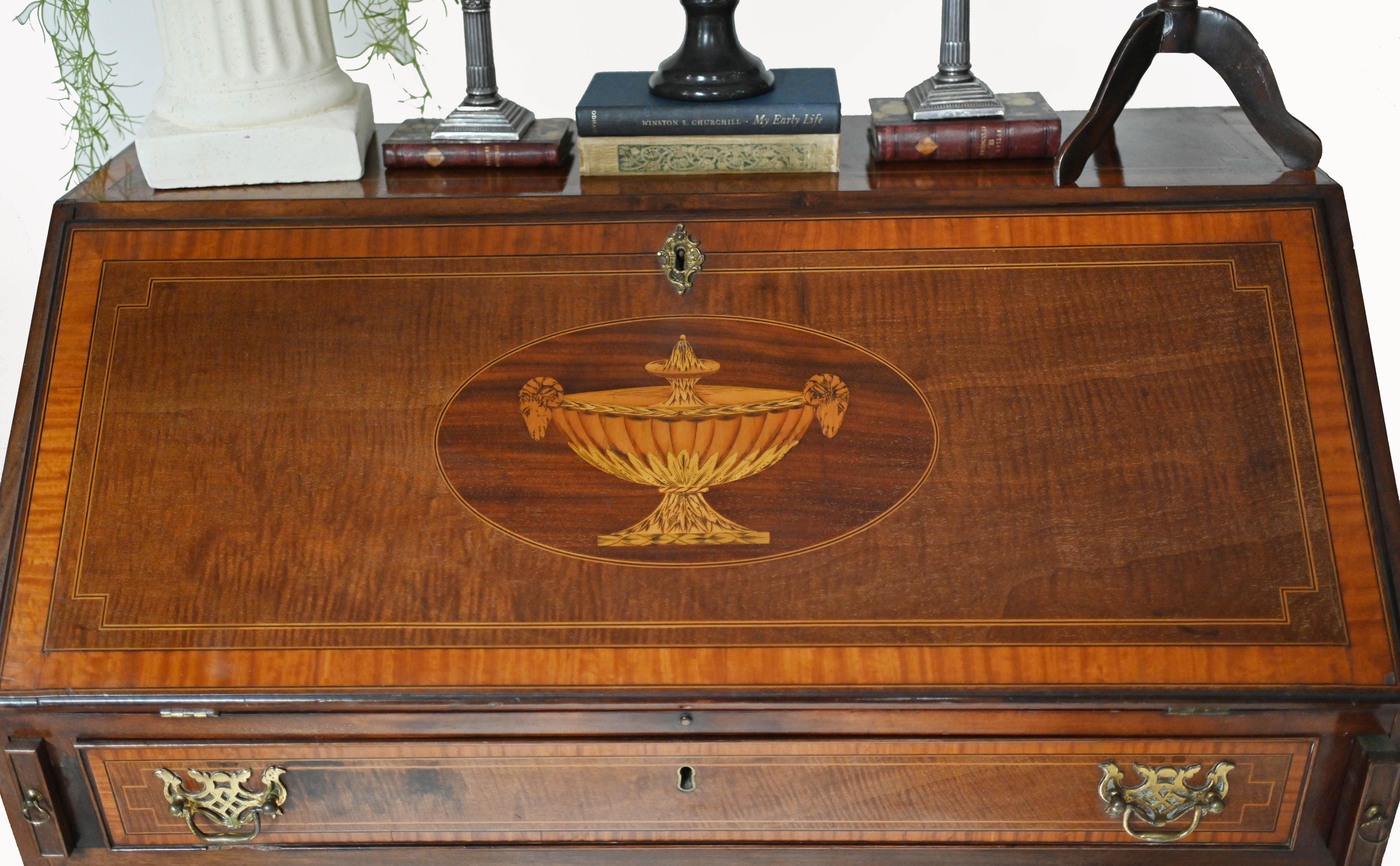 
Gorgeous George III bureau made by Edwards and Roberts of London (please see close up photo of the stamp)
A good quality George III bureau secretary in mahogany with original brass handles on bracket feet
Inlay work to centre of panel shows a