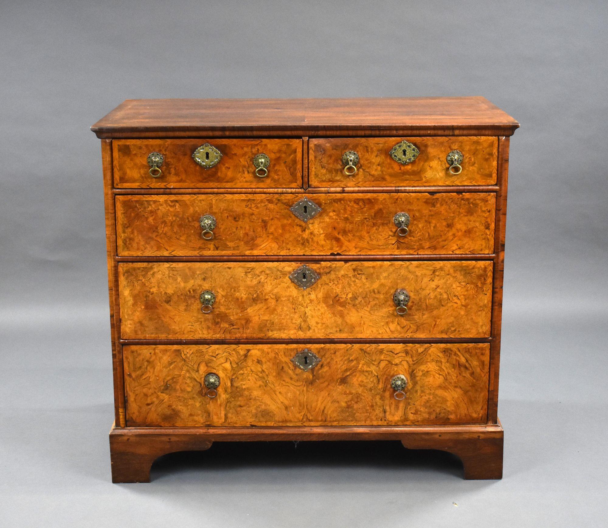 For sale is a good quality George II burr walnut chest of drawers, having a feather banded top above an arrangement of five drawers, each with original handles. The chest remains in very good condition for its age.
Measures: width: 101cm, depth:
