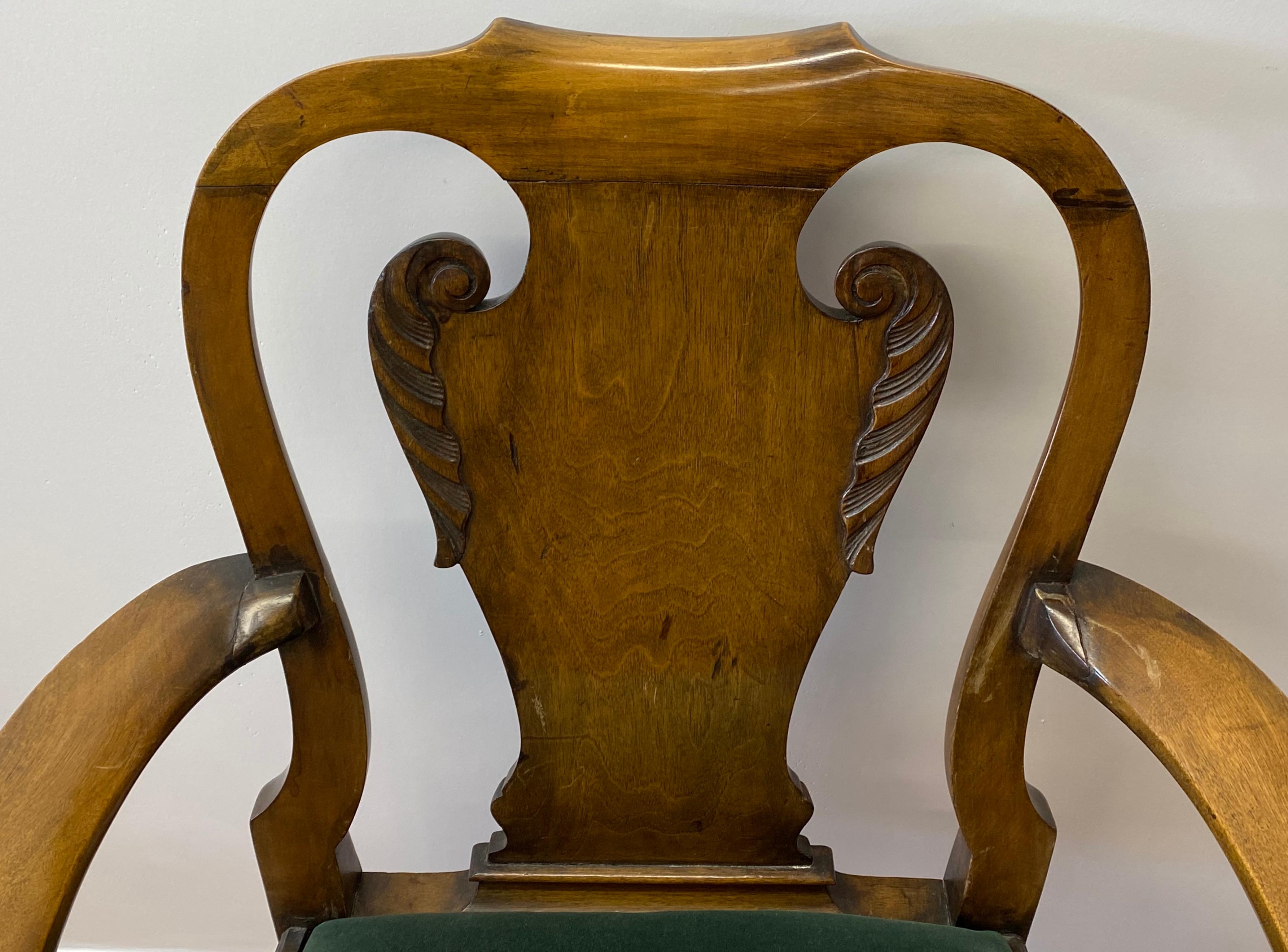 Queen Anne Style carved mahogany armchair, circa 1830

Handsome hand carved mahogany arm chair.

Most likely imported to the United States from England

Measures: 28