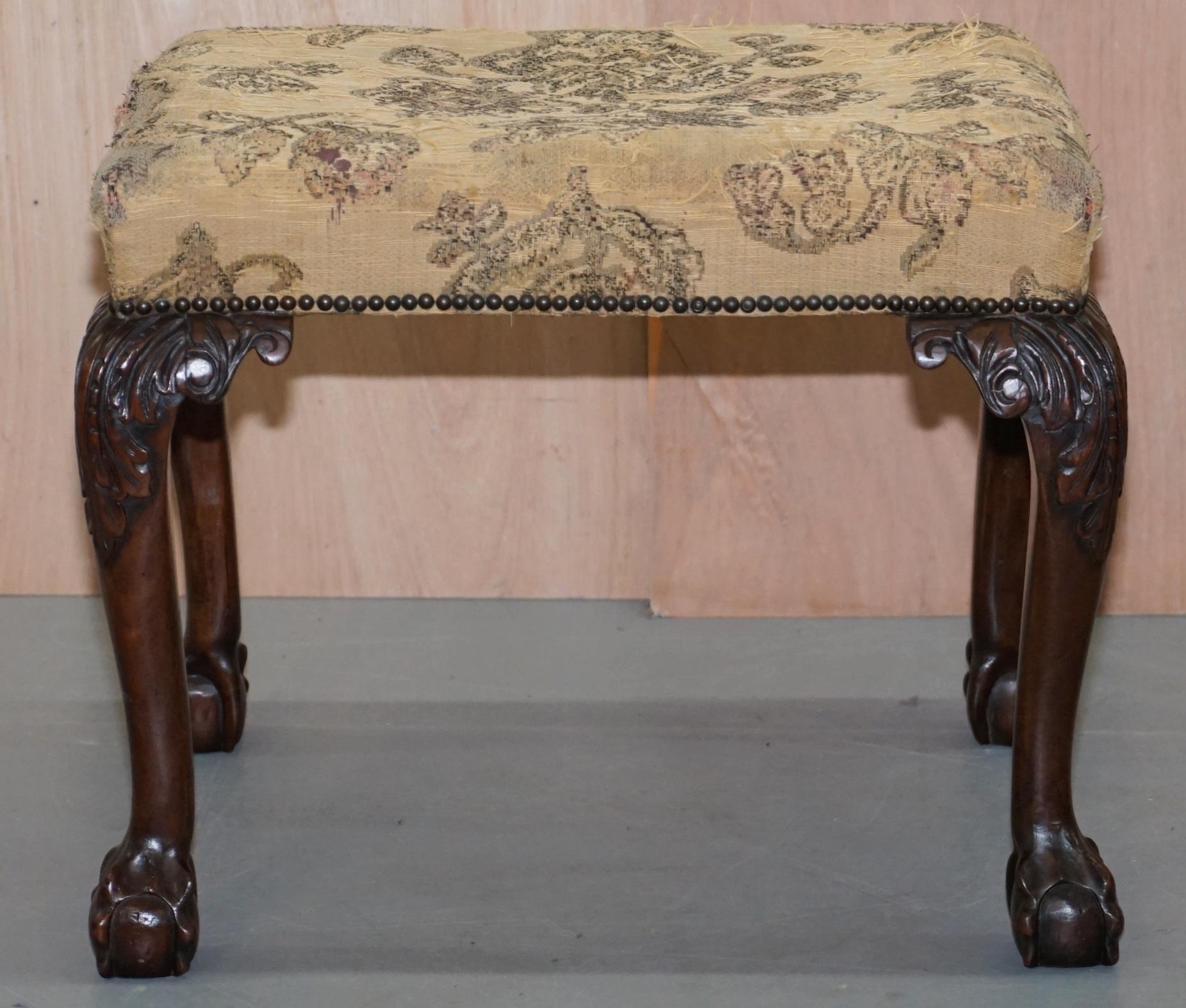 We are delighted to offer for salethis lovely hand carved Georgian Irish / George II mahogany stool with original floral embroidered upholstery and claw & ball feet

A very good looking well made and decorative piece, this is like art furniture to