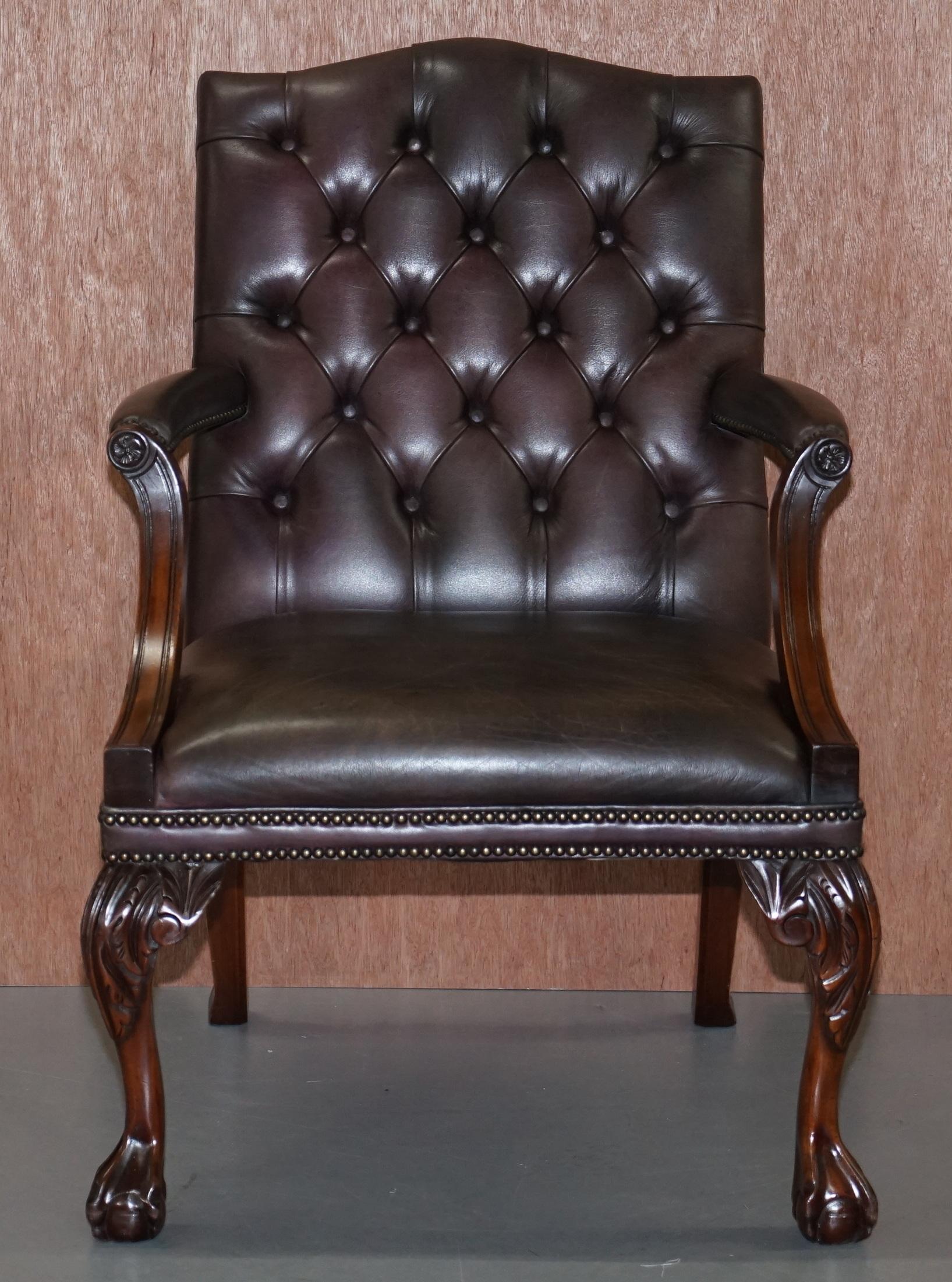 We are delighted to offer for sale this stunning hand carved mahogany framed George II style Gainsborough armchair with claw and ball feet

A very good looking well made and decorative armchair, the leather upholstery is Chesterfield tufted to the