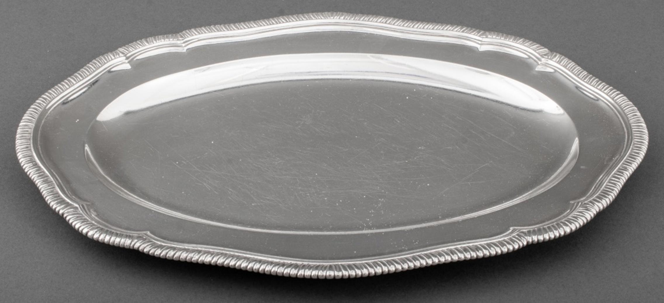 George II Irish sterling silver serving tray, struck to underside with maker's marks of Robert Calderwood, Dublin, 1735, date mark indistinct, and 