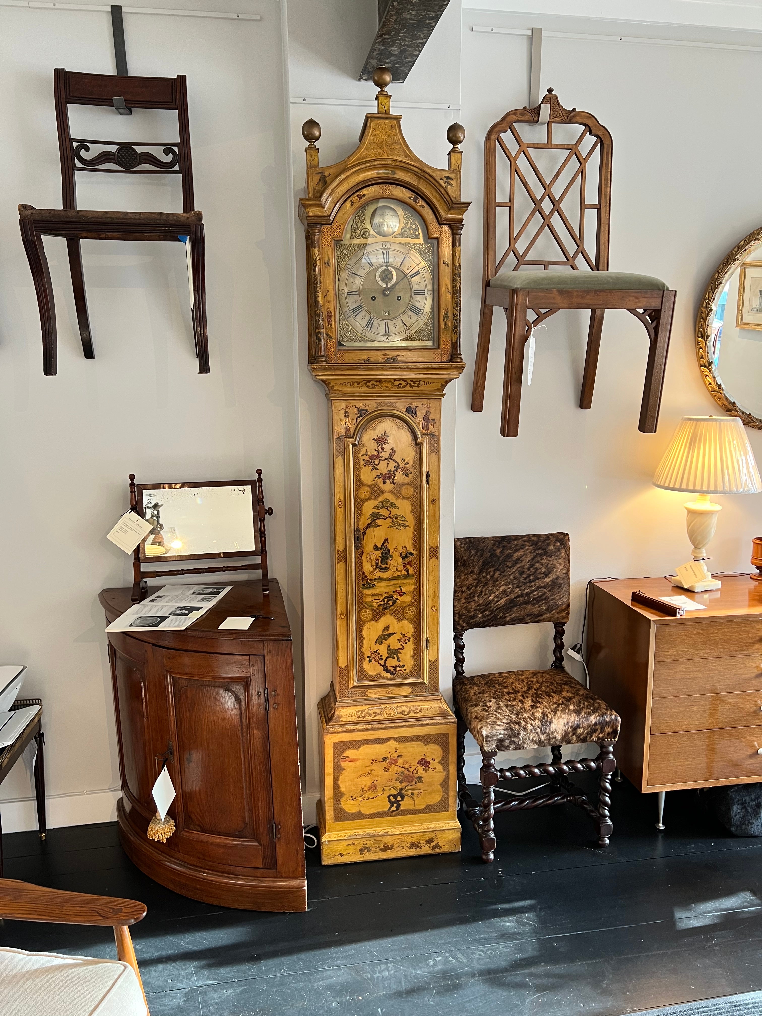 George II Japan painted tall case clock
This Yellow chinoiserie japan painted tall case clock with
It’s origanal 8 day movement with date & second hand 
With 3 ball finials. The movement has been restored & its 
Case was touched up. Ready to be