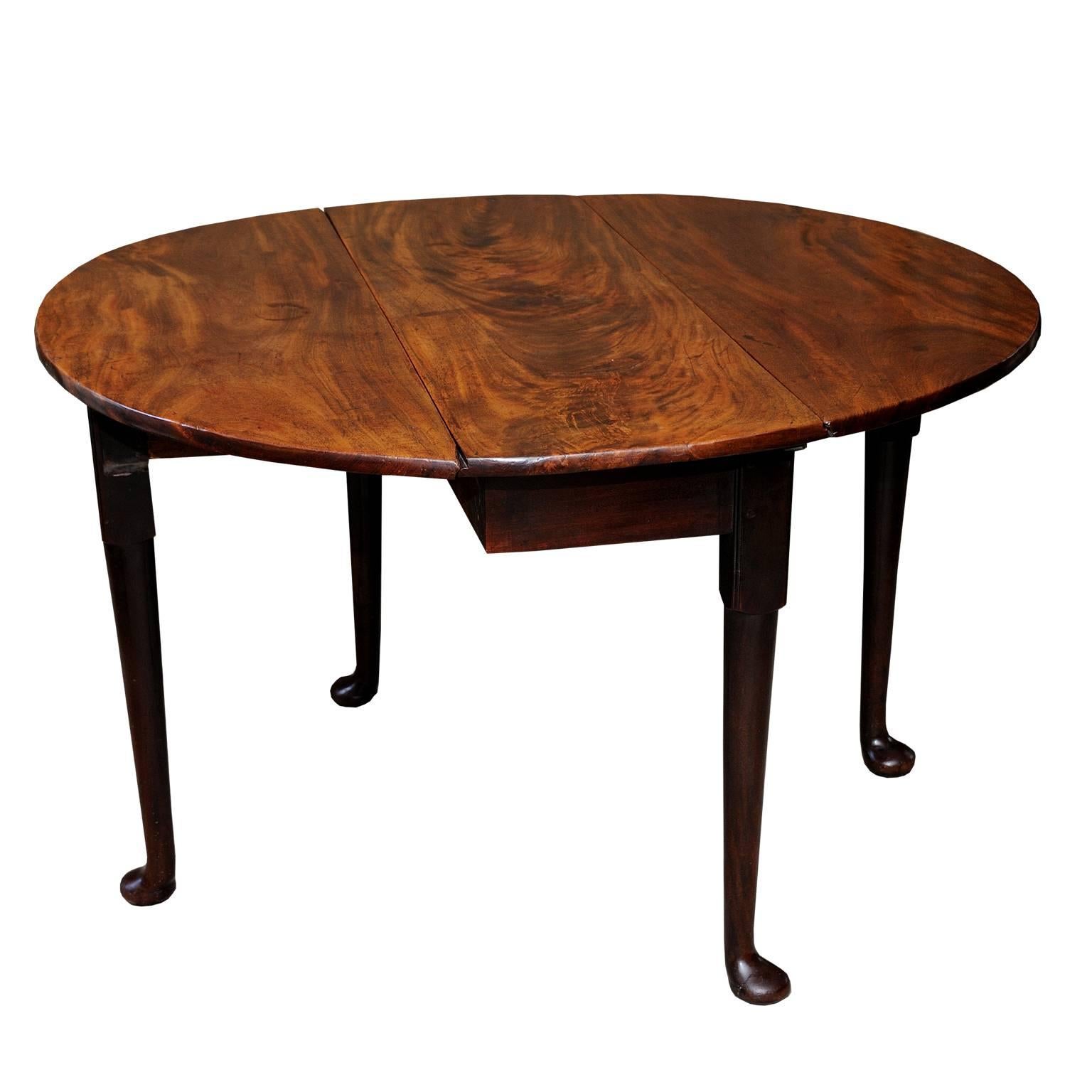 A fine mid-18th century George II pad foot oval gate leg table in well figured mahogany, circa 1740.