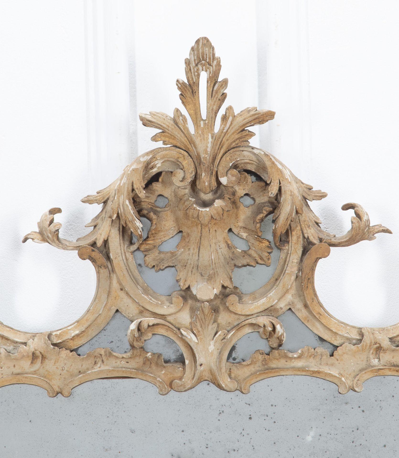 A finely carved English 18th Century George II painted Mirror in the manner of Matthias Lock.

Retaining historic original paint layers and with beautifully foxed and sparkling mercury plates.

Circa 1745.

See Christies ‘Farringdon House’ sale for