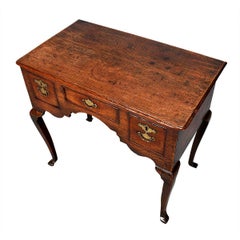 George II Period Oak Lowboy on Four Angular Cabriole Legs