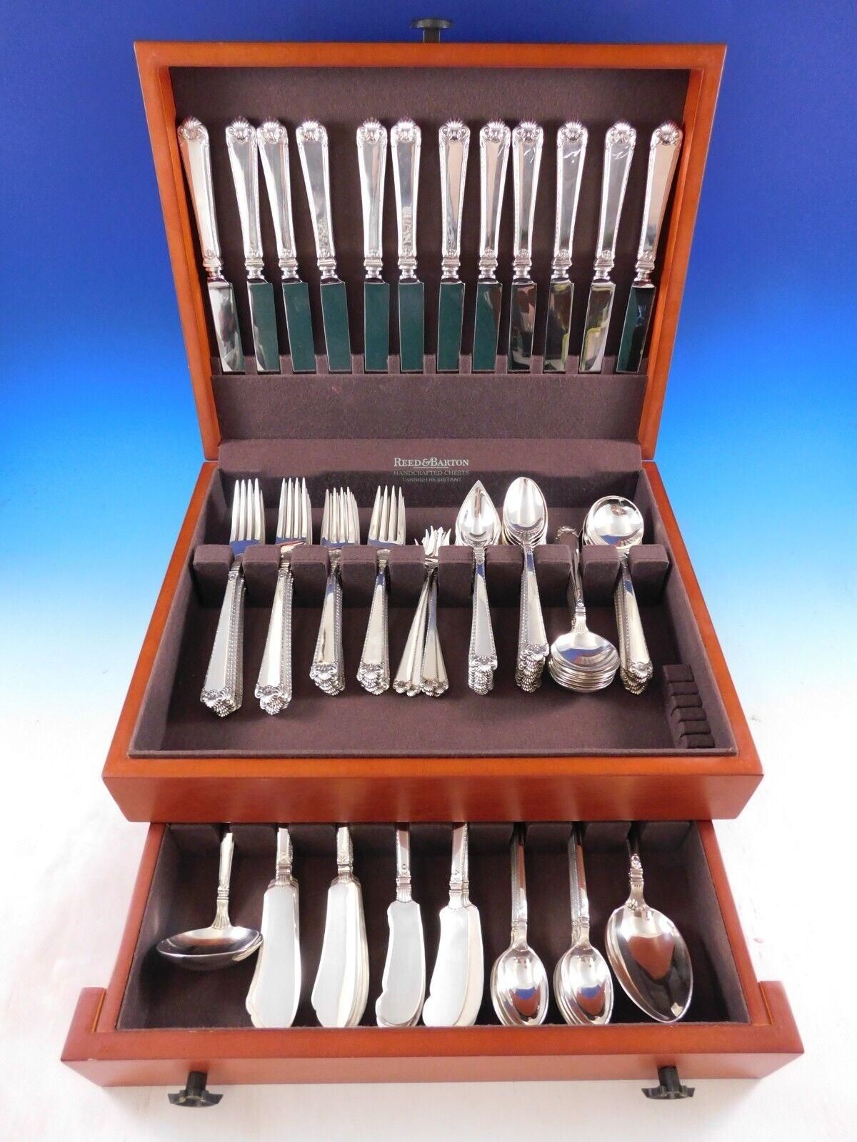 George II Rex Hand Chased by Watson sterling silver Flatware set, 123 pieces. This set includes:

12 Knives, 9 3/8