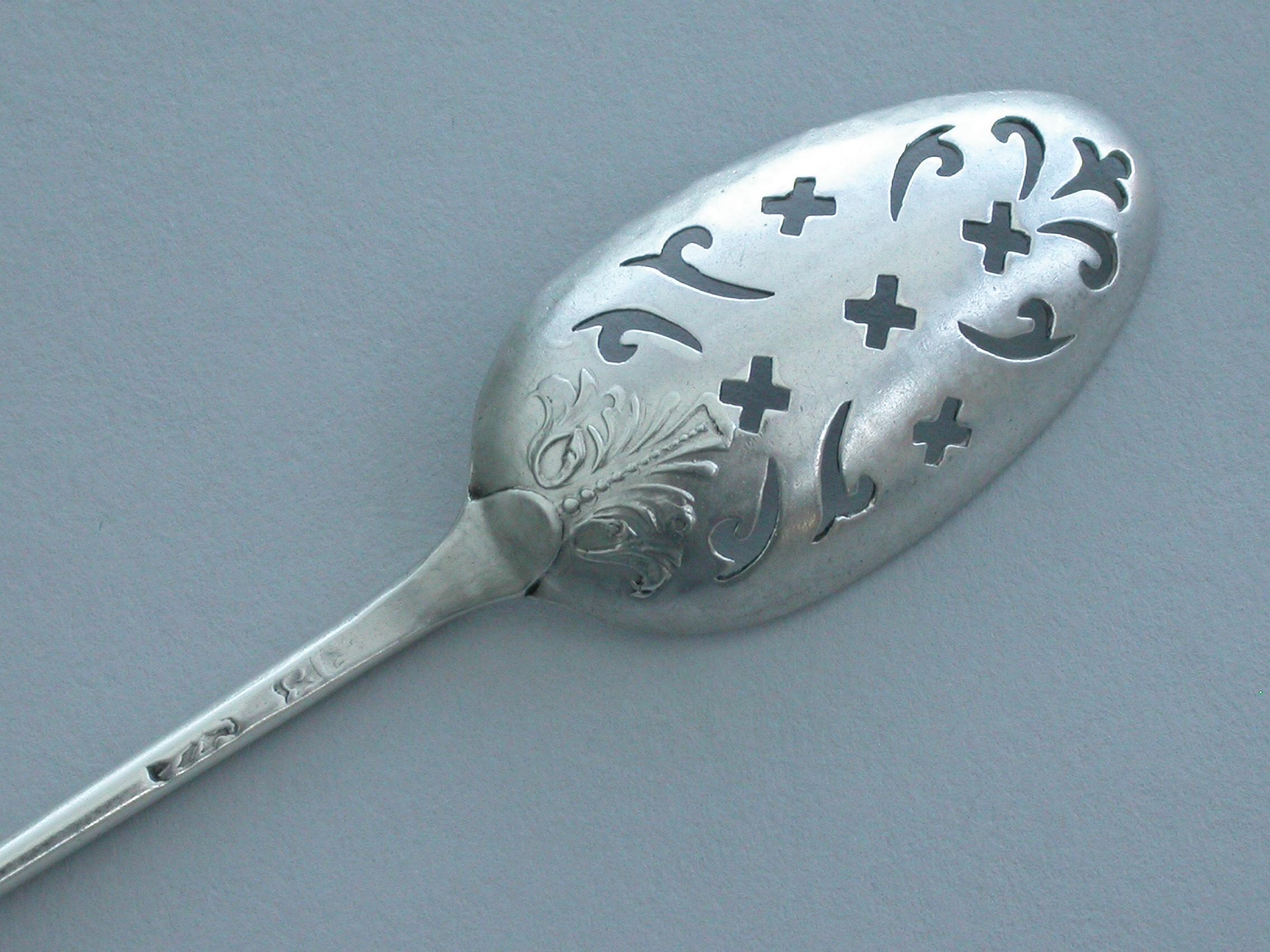 English George II Rococo Silver 'Fancy-Back' Mote Spoon by Elias Cachart, London For Sale