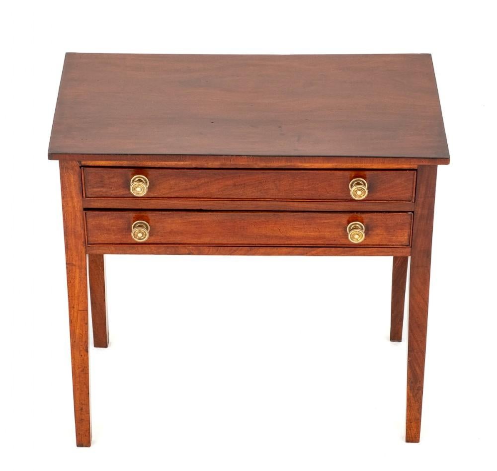 George II Mahogany Side Table.
This Side Table is of a Plain Form.
19th Century
Standing on Tapered Legs.
The Table Features 2 Drawers which Retain The Original Cast Brass knobs.
Presented in Good Condition