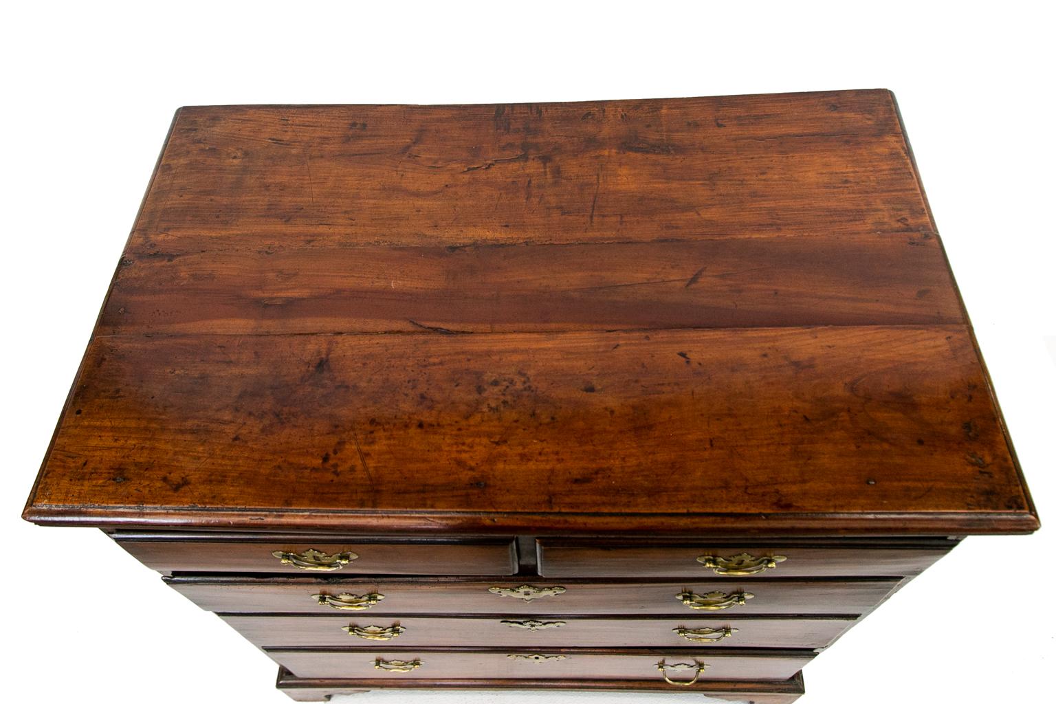 George II solid cherry chest, a very rare 18th century chest being solid cherry, it has the original brass hardware as well as a beautiful patina and color.
      