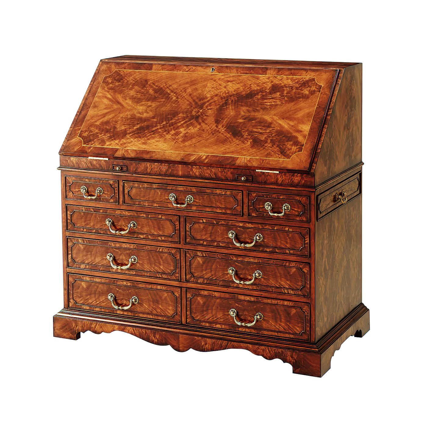 A George II style flame mahogany bureau, the sloping fall enclosing a fitted interior of faux book and hidden drawers and cabinets, the staircase gallery interior, above a short frieze drawer flanked by dummy drawers, with two short and two long