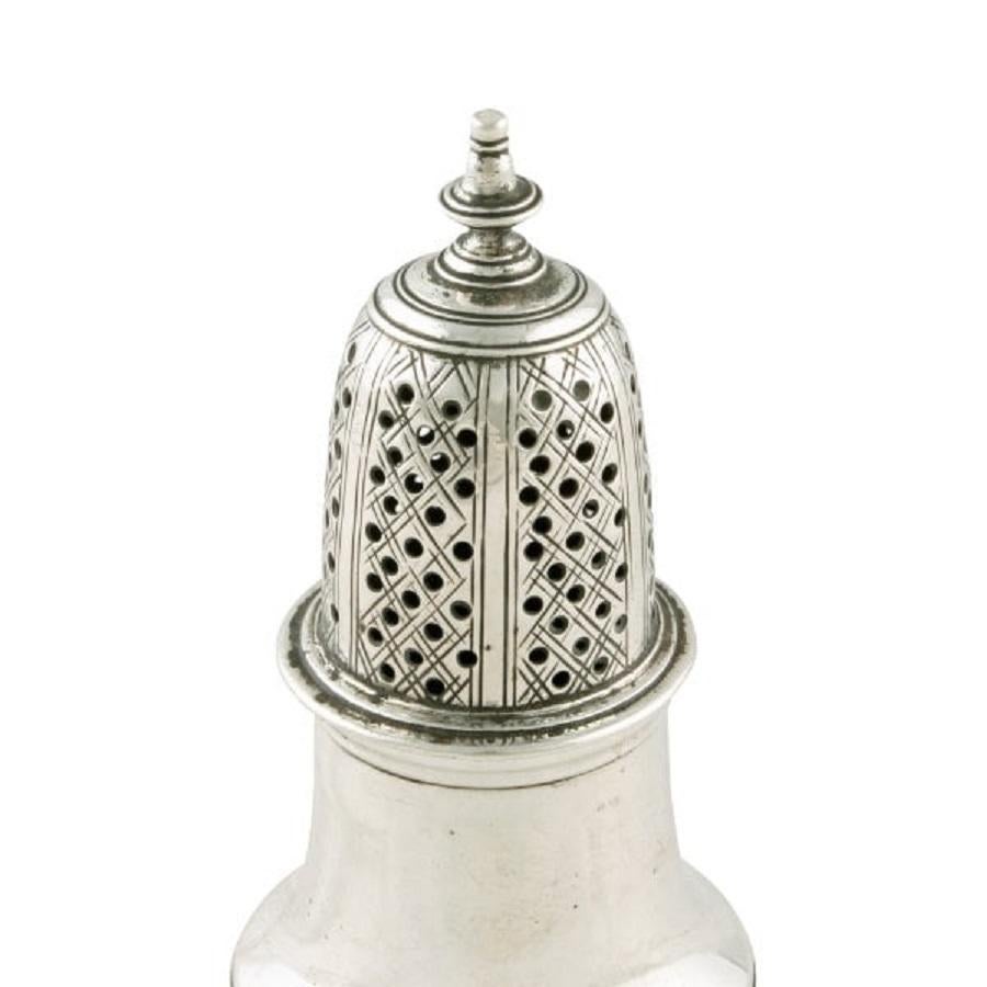 A mid 18th century George II sterling silver hall marked pepper caster.

The caster has hall marks for London, the year 1753 and the maker's mark for Jabez Daniell.

The caster is baluster in shape with a finial to the top and a moulded raised