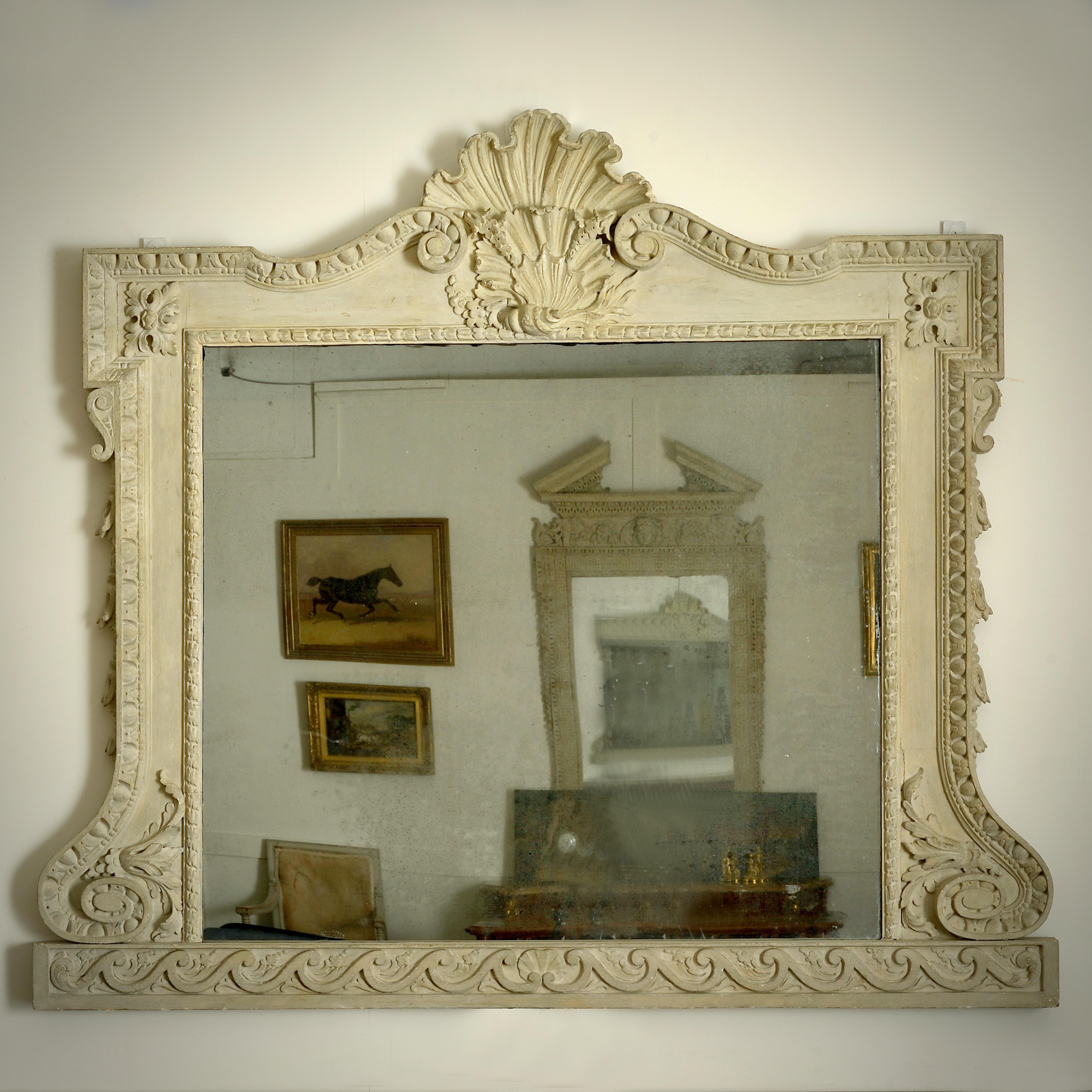 UN FINE SURMANTEL GEORGE II PEINT EN PIERRE ET BLANC A LA MANIERE DE WILLIAM KENT, Circa 1740.