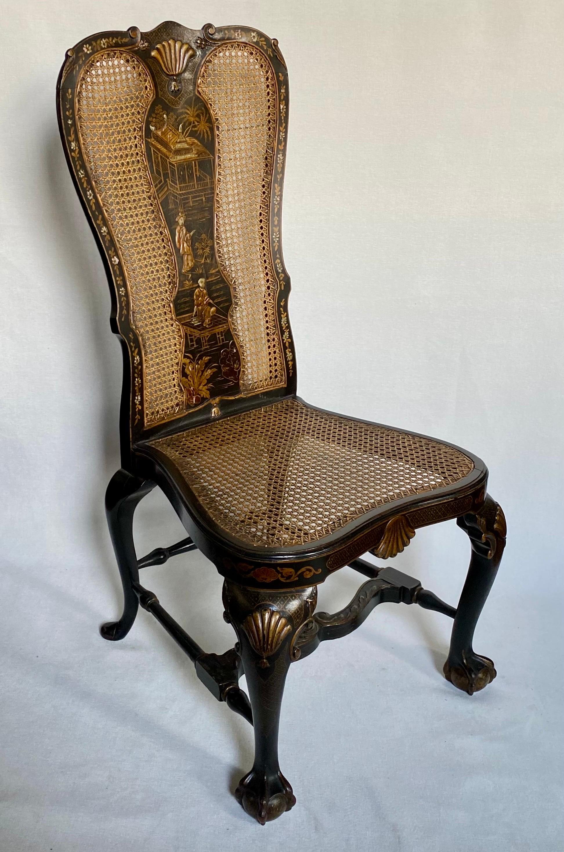 George II Style Chinoiserie Japanned gilt decorated ebonized cane side or desk chair with removable down filled red velvet seat cushion.   Beautifully curved cabriole legs with paw ball & claw feet.  Late 19th Century 