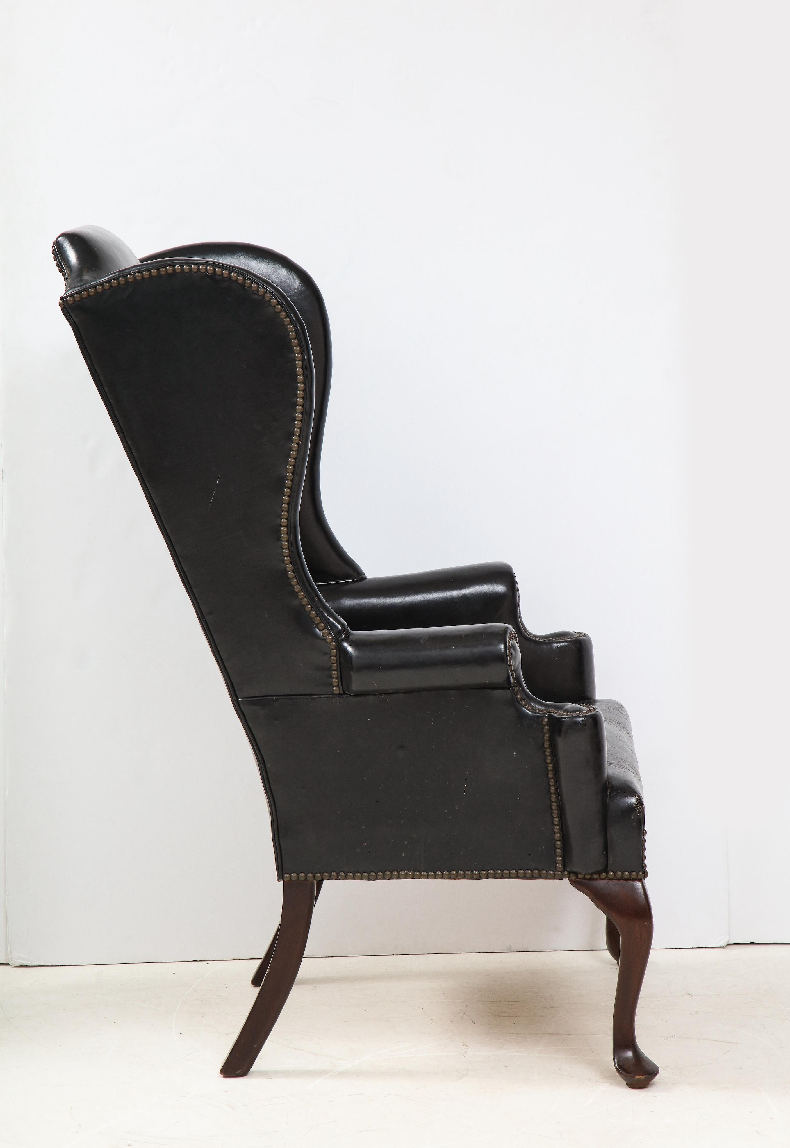 English George II Style Mahogany and Black Leather Upholstered Wing Chair