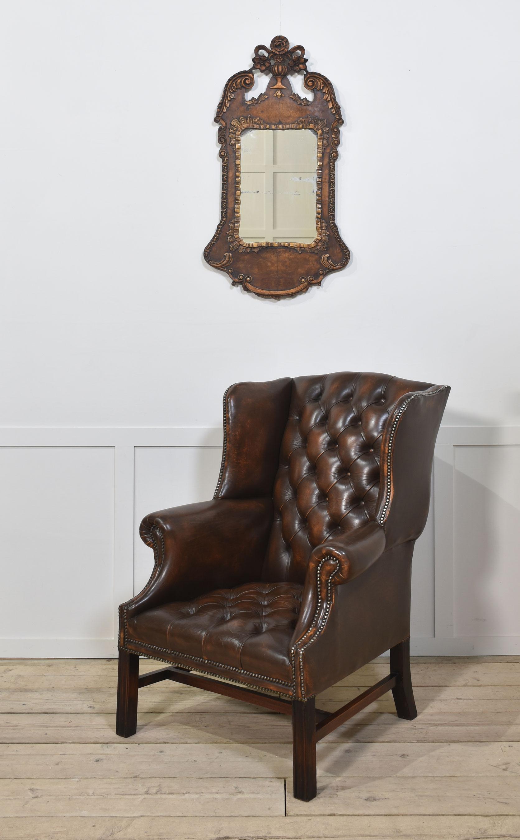 Walnut and parcel gilt wall mirror. The original rectangular mirror plate is surrounded by a walnut frame with carvings and applied scrolling decoration.
Dimensions
Height 40.5 Inches
Width 21.5 Inches
Depth 3 Inches