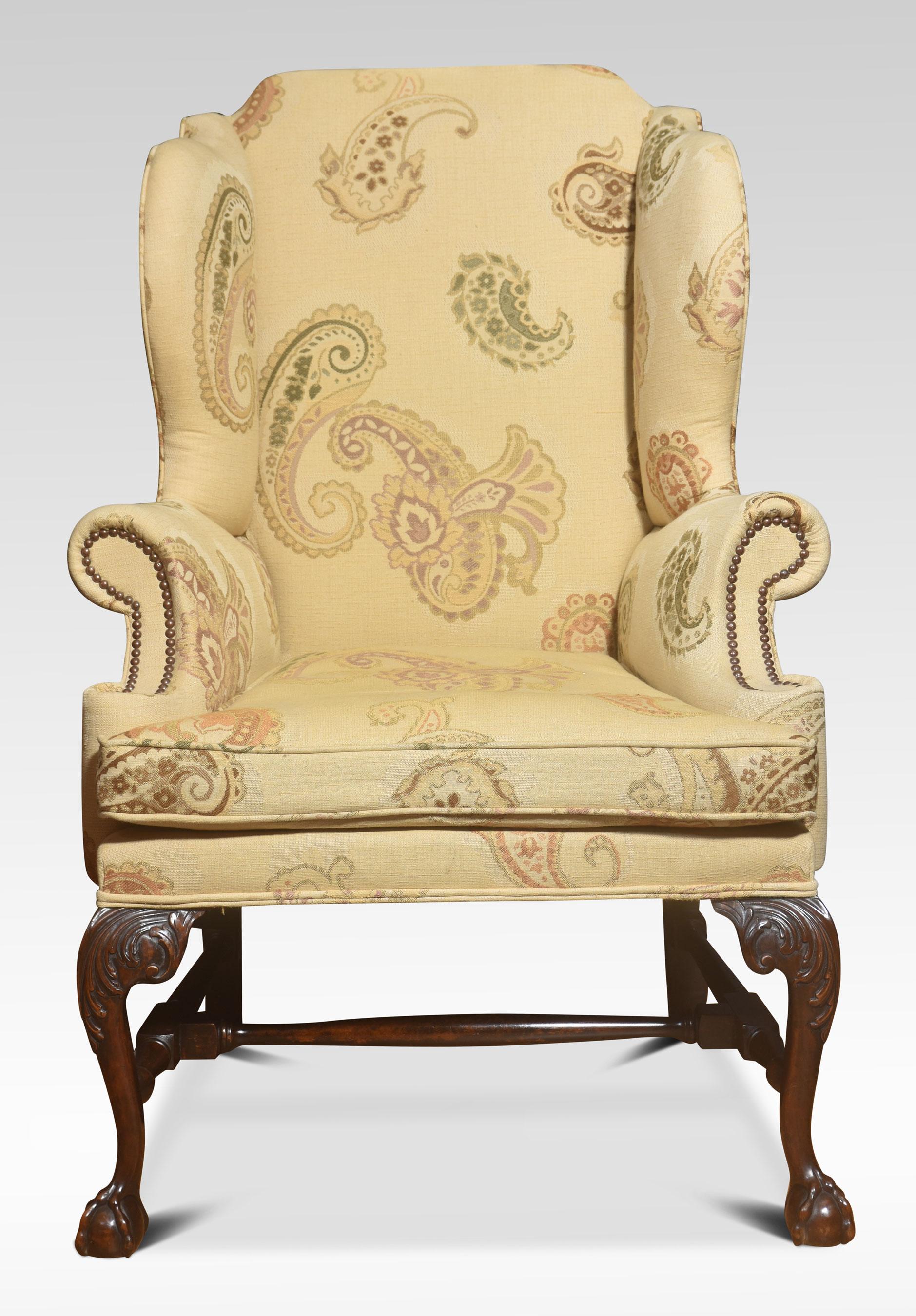 Wood George II style wing back armchair For Sale