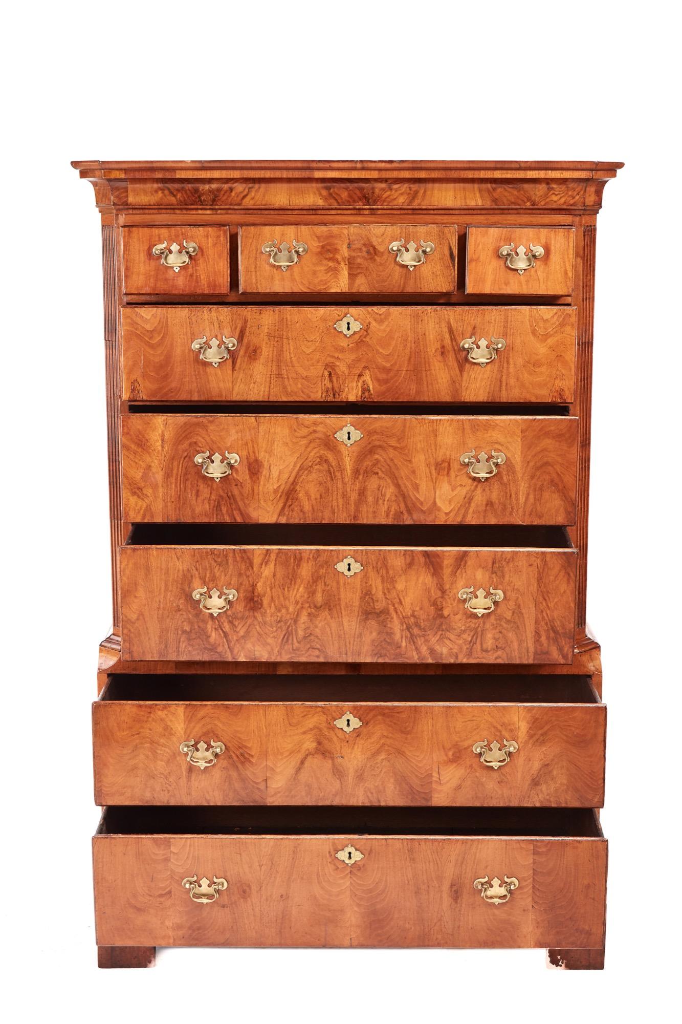 George II walnut chest on chest,the upper section,having a shaped moulded cornice,three short and three long drawers,reeded canted corners,the base with a moulded edge,two long drawers,standing on original bracket feet,
All drawers are oak