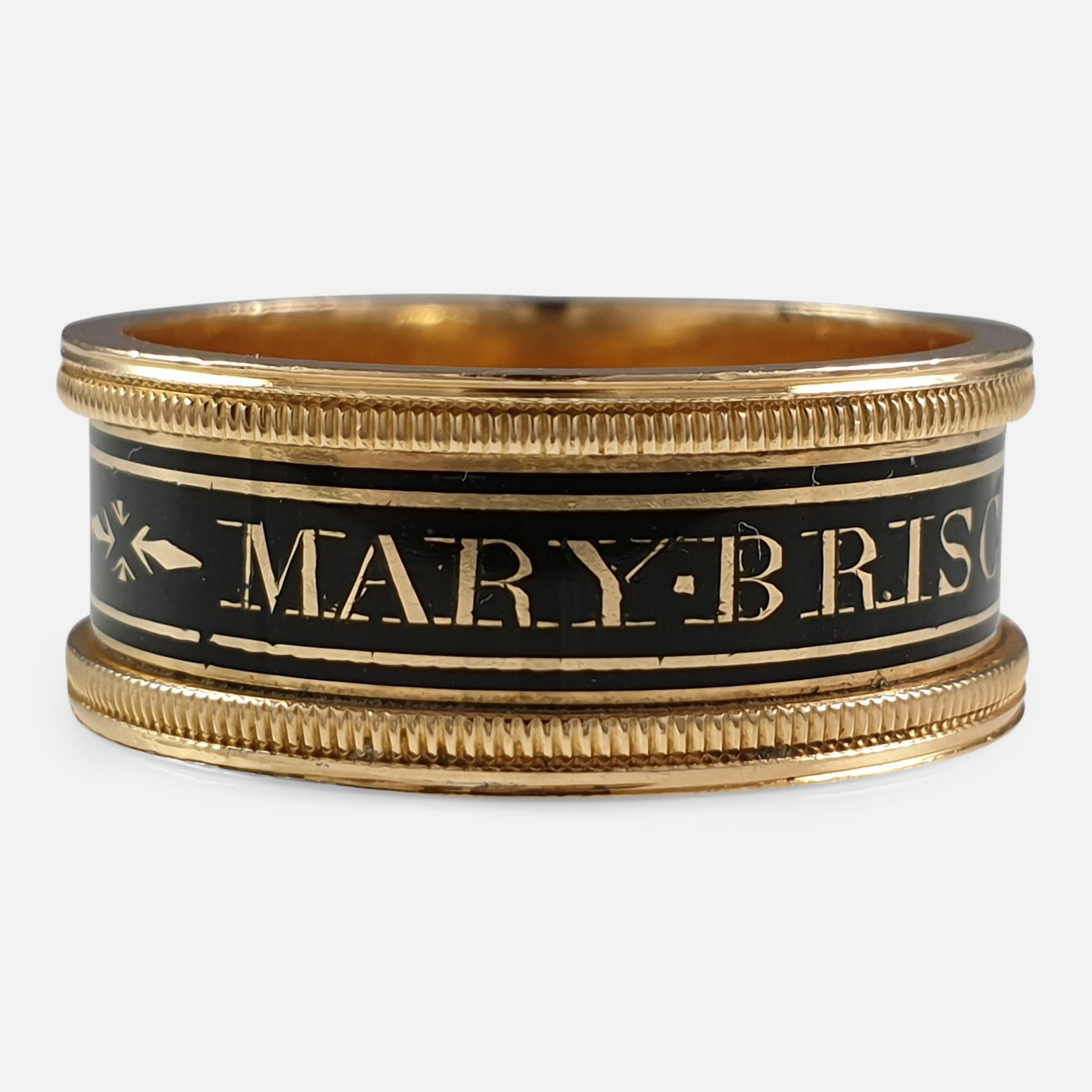 A George III 18k yellow gold and black enamel memorial mourning ring. The band reads 