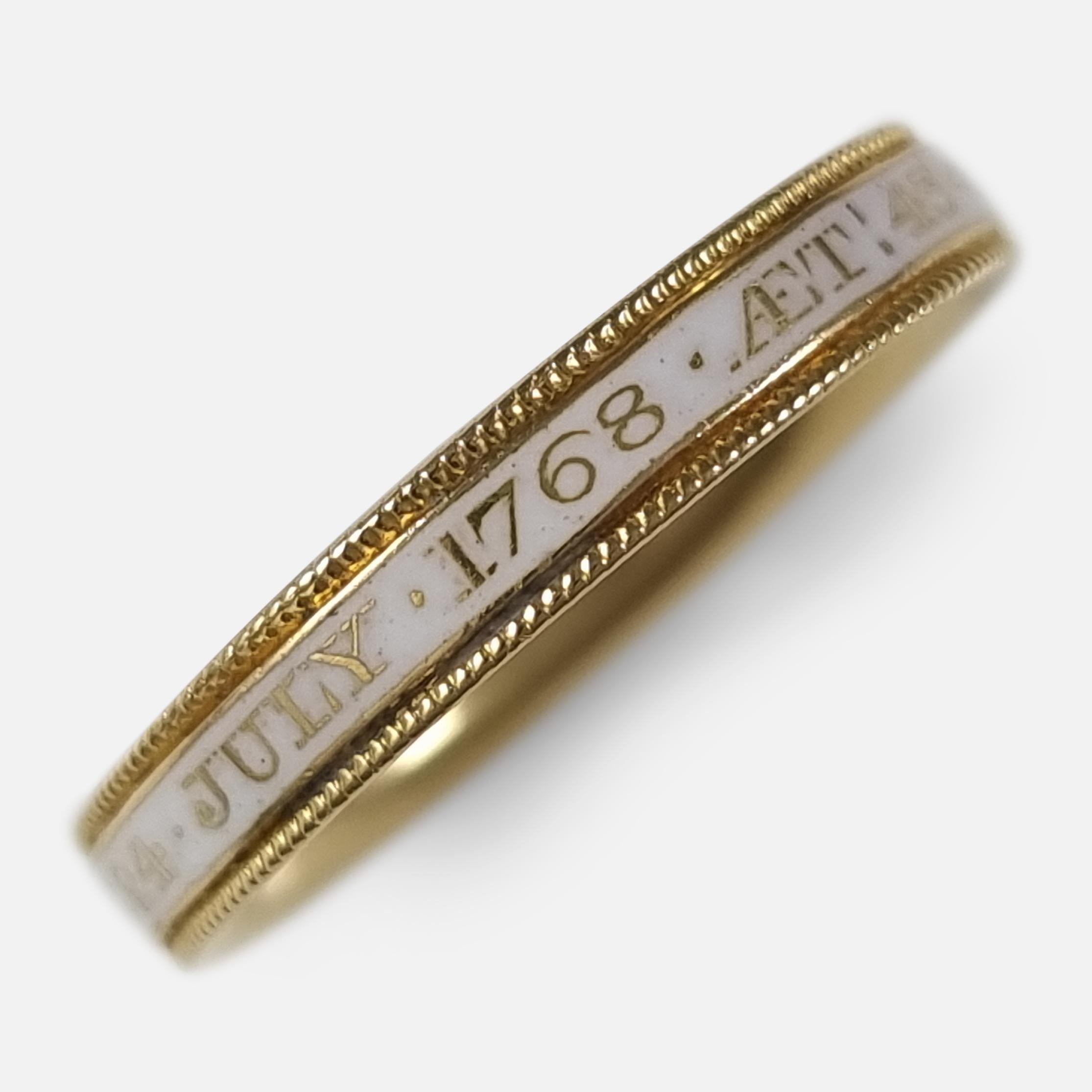 A George III 18ct yellow gold and white enamel memorial mourning band ring.

The ring bears the inscription 