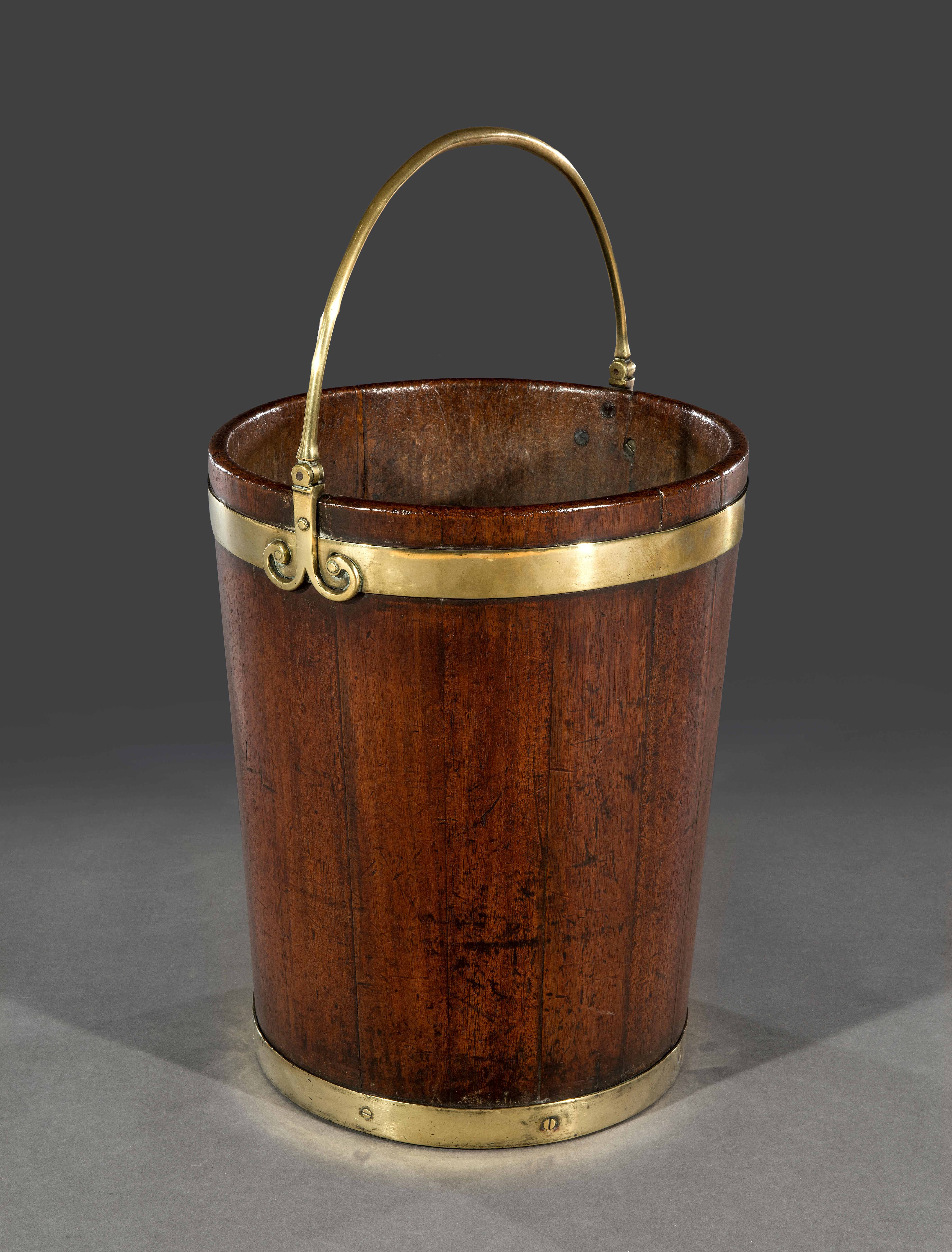 George III 18th century brass-band mahogany peat bucket.