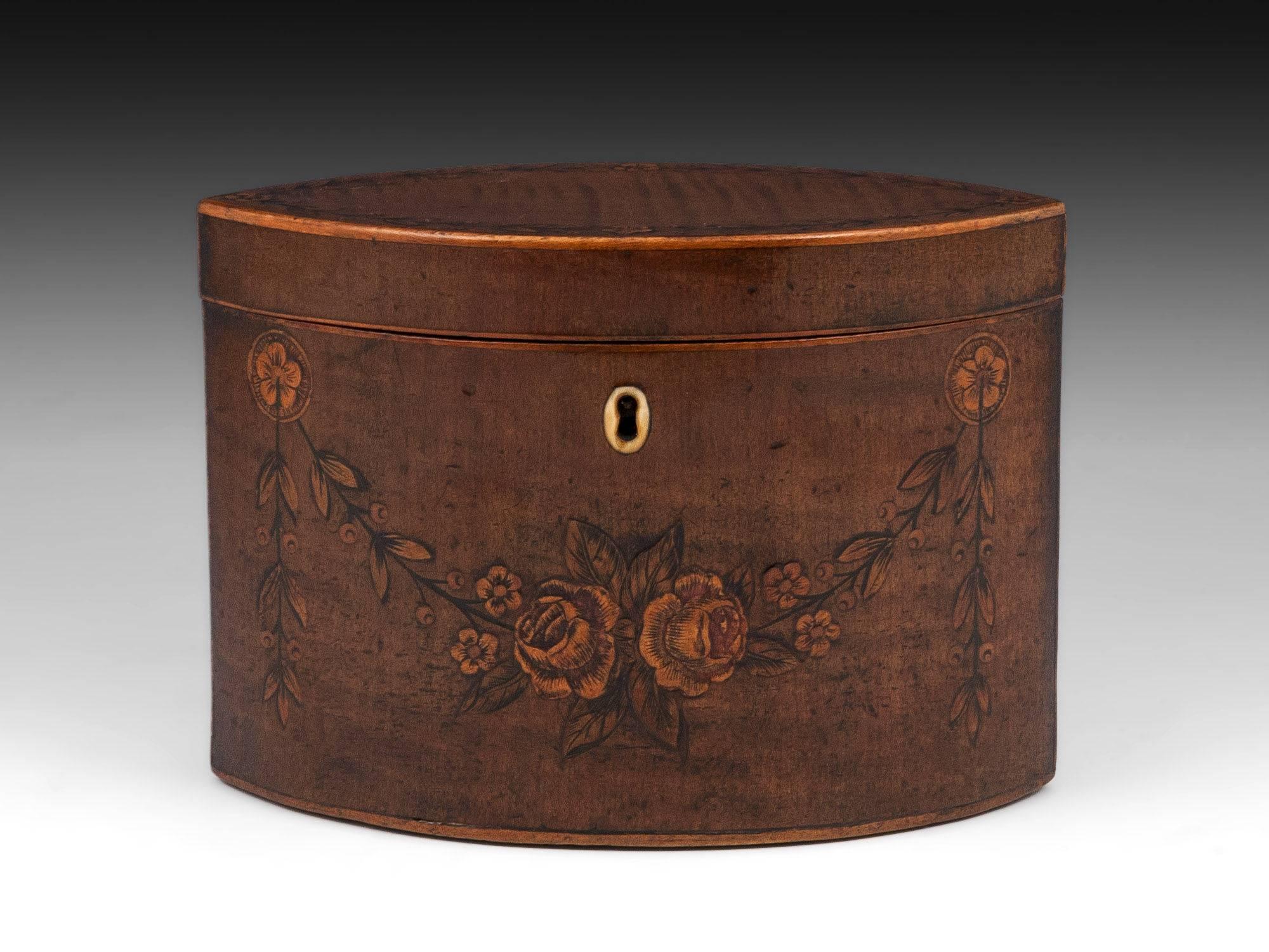 The top the lid is delicately inlaid with flower bells and opens to reveal the original zinc lining and the original lid. The front the tea caddy is exquisitely inlaid with flowers and bells.