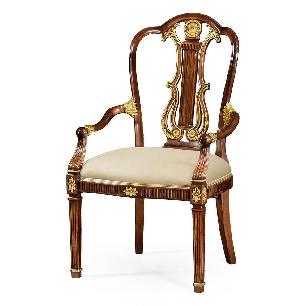 An elegant English neoclassic style mahogany side chair with elaborate carving to the curved lyre splat back highlighted with gilded details. Serpentine front rail with gilded paterae and tapering square cross-section front legs. After an original