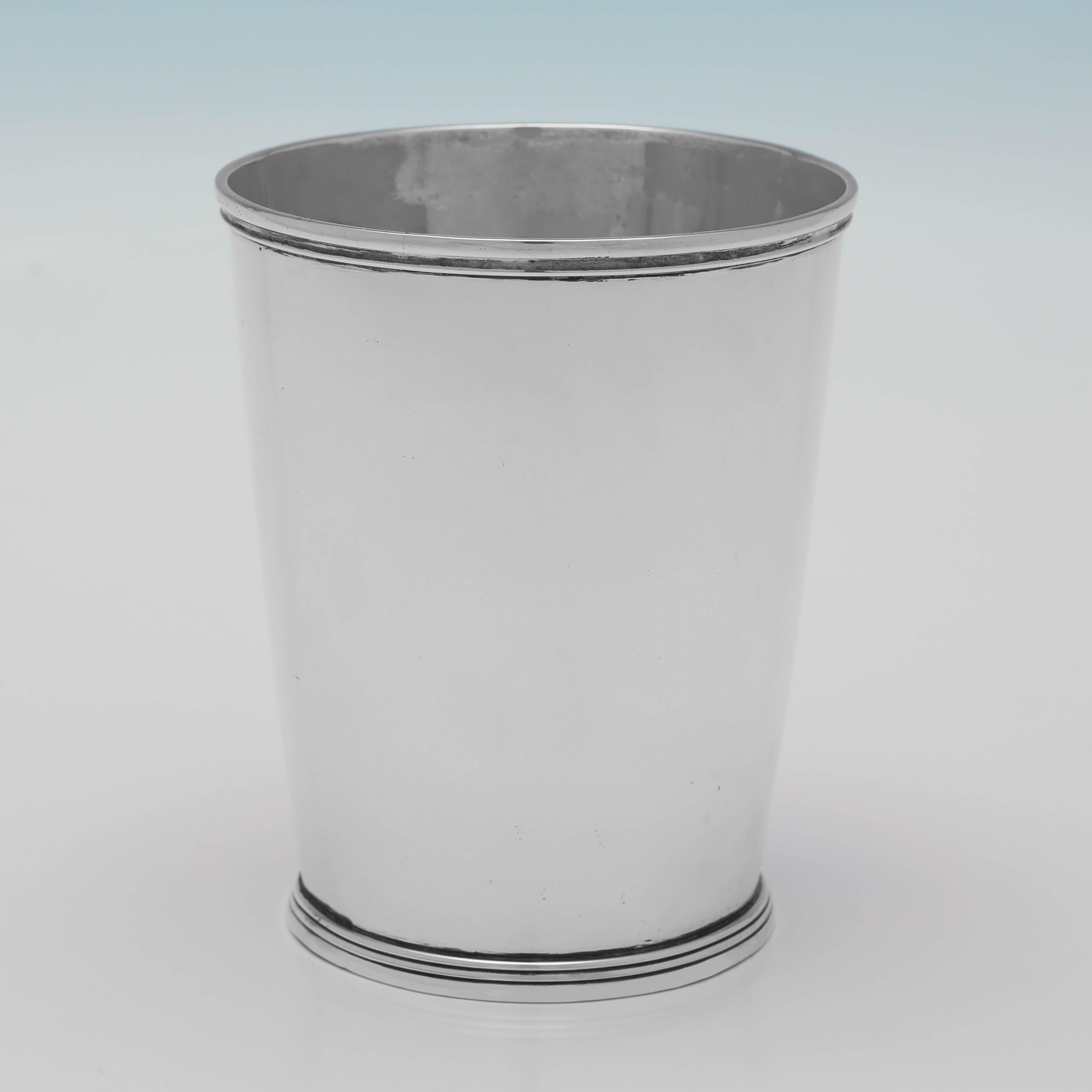 Hallmarked in London in 1805, this very handsome, George III period, Antique Sterling Silver Beaker, is plain in style, with reed borders around the rim and base. The beaker measures 3.5