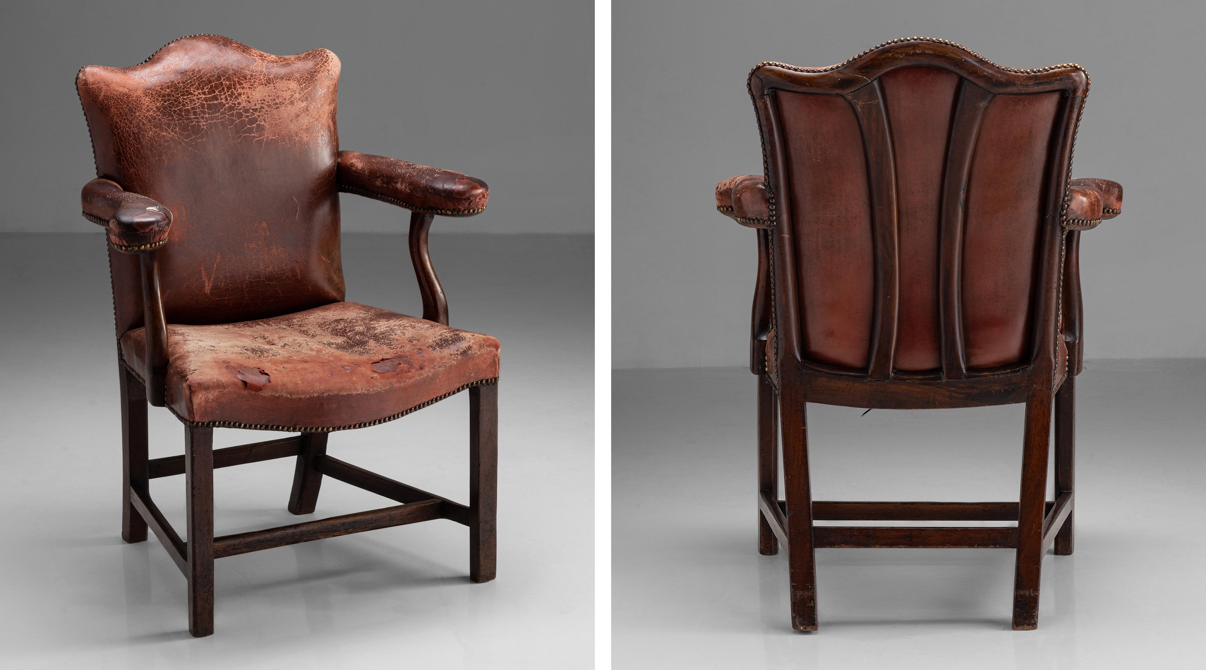 George III armchair,
England Circa 1830,
Constructed in mahogany with original leather upholstery. Originally from the private office of the late HSH Prince Rupert Loewenstein, former business manager of the Rolling Stones.