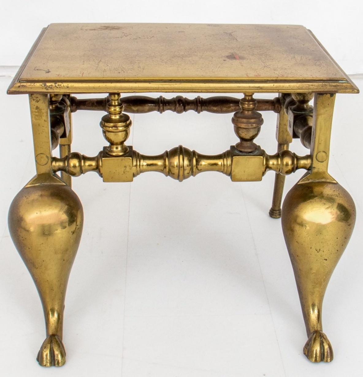 George III period English Brass Hearth Bench or Warmer, 18th or 19th C, of typical form, rectangular with handles above cabriole legs. 

Dimensions: 12