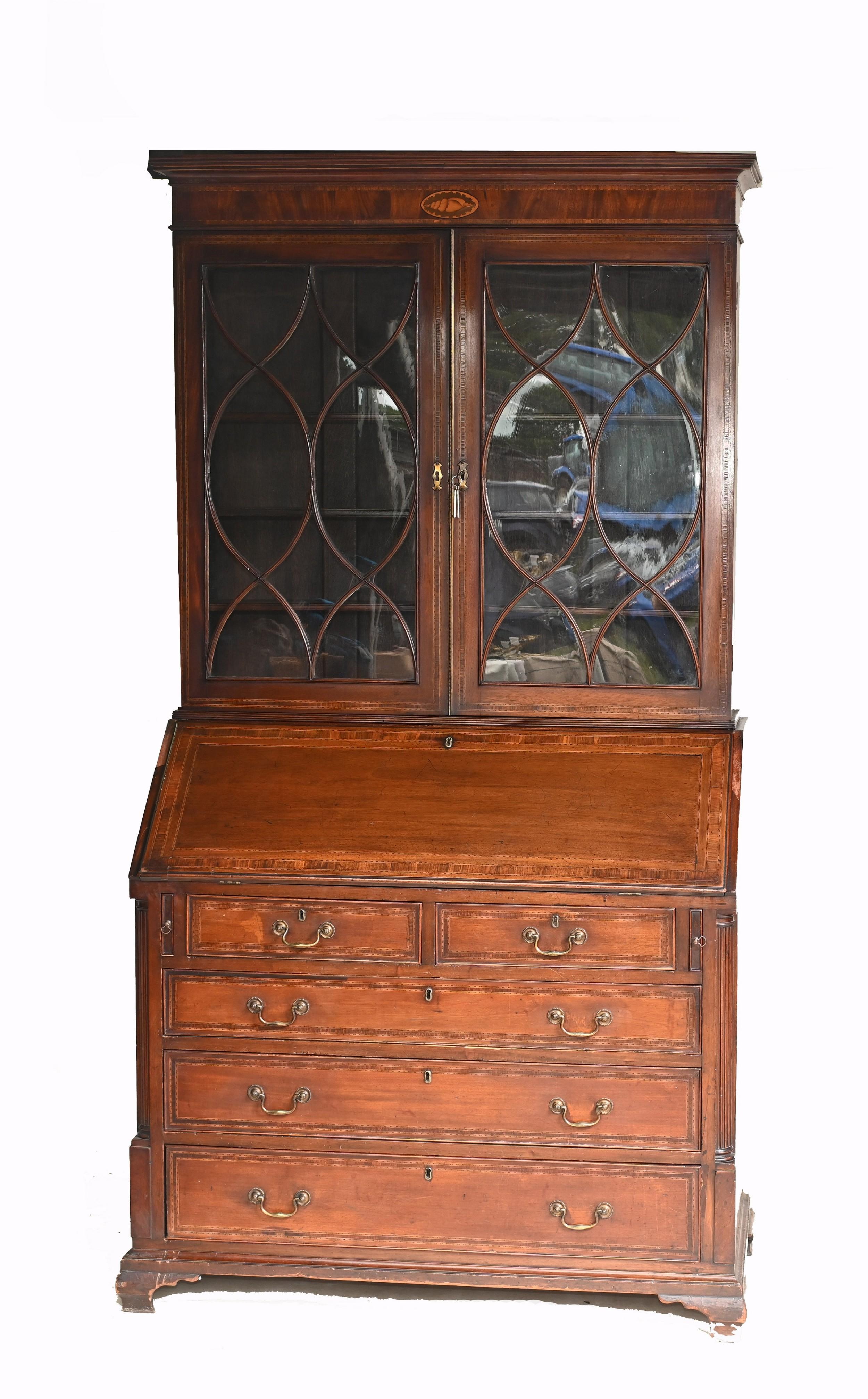 Classic George III bureau bookcase in mahogany
Dates to circa 1790
Both a bookcase and a desk
Practical, elegant and stylish
Some of our items are in storage so please check ahead of a viewing to see if it is on our shop floor
Offered in great