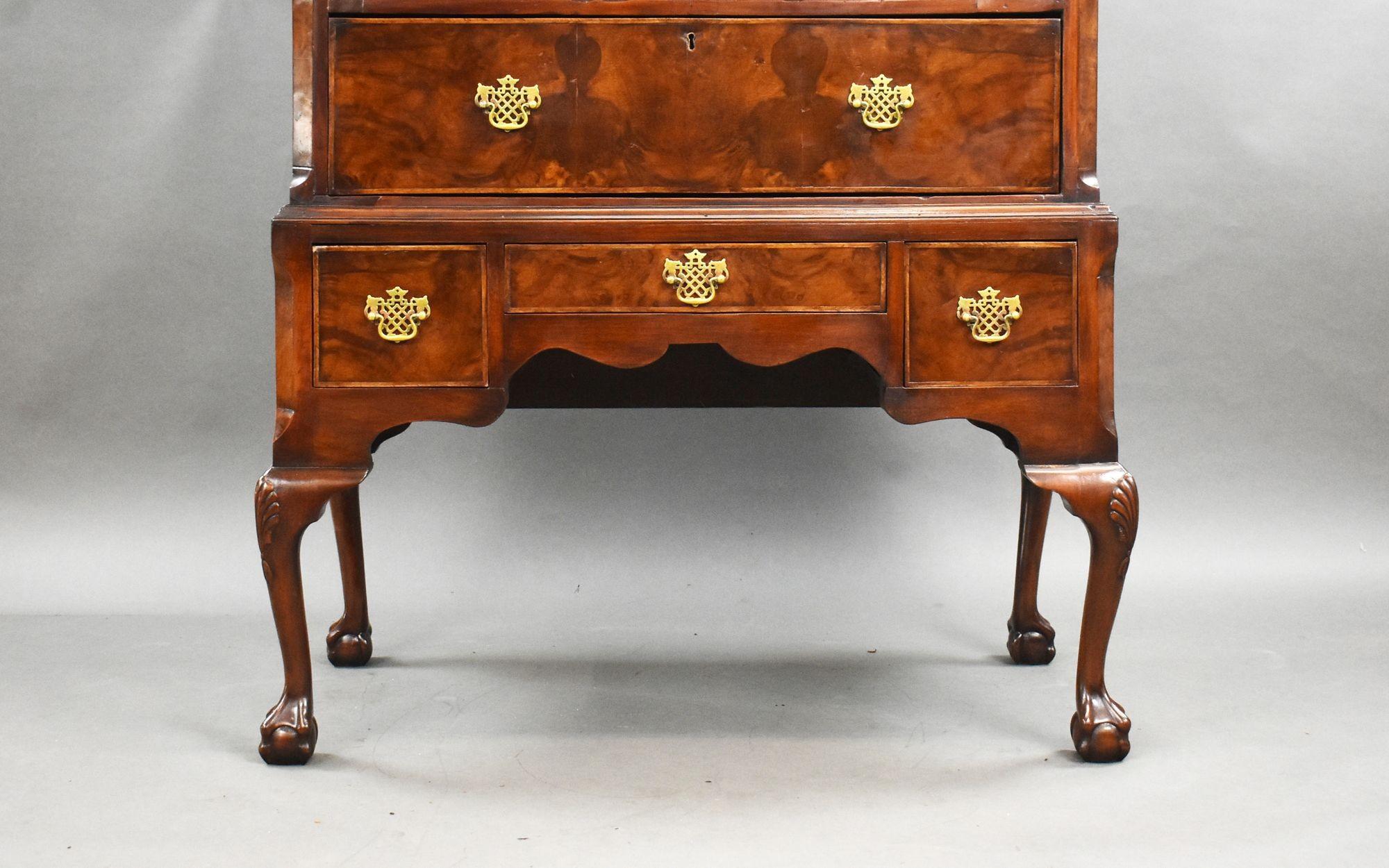 For sale is a George III burr walnut chest on stand, having an arrangement of four graduated drawers above the stand, with a further three drawers below, each with brass handles, standing on cabriole legs terminating on ball and claw feet. The chest