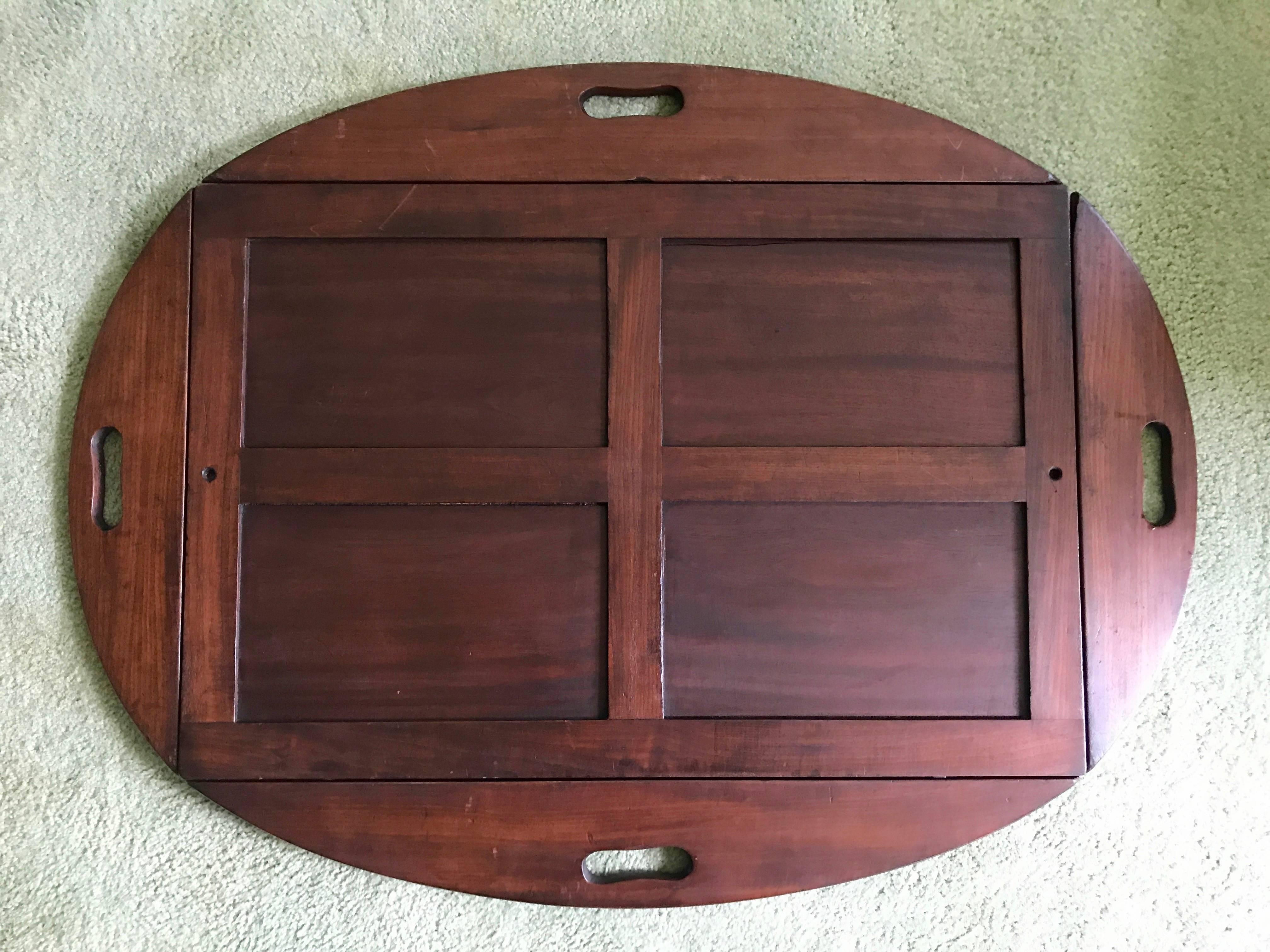 George III mahogany Butler’s tray circa 1780, with brass bound hinges. Stand is not original and much newer. Measures: 31.5” W 39.5” L 25” H Handles up: 22” W x 31” L.