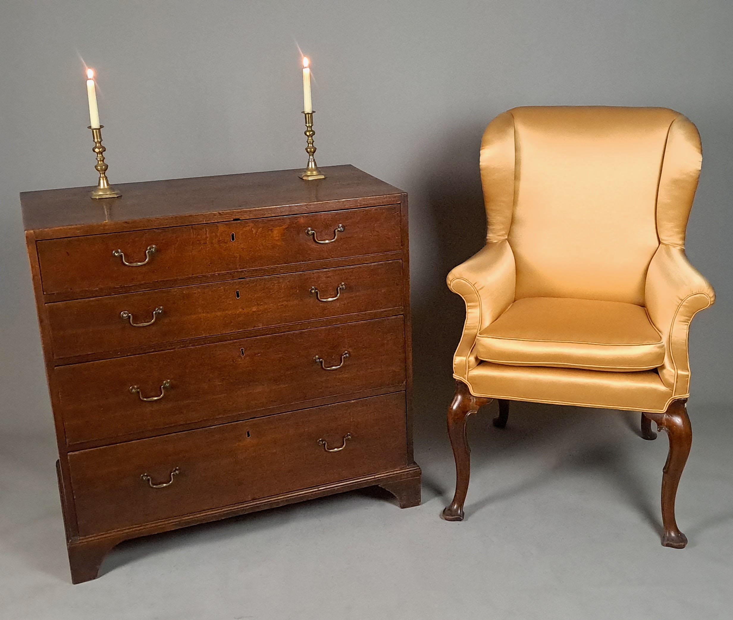 A very original small chest of drawers made by hand in around 1790.  The top and drawer fronts in solid oak with medullary rays, the side panels in a rich and warm figured elm and the four long graduated drawers all with original pine linings with