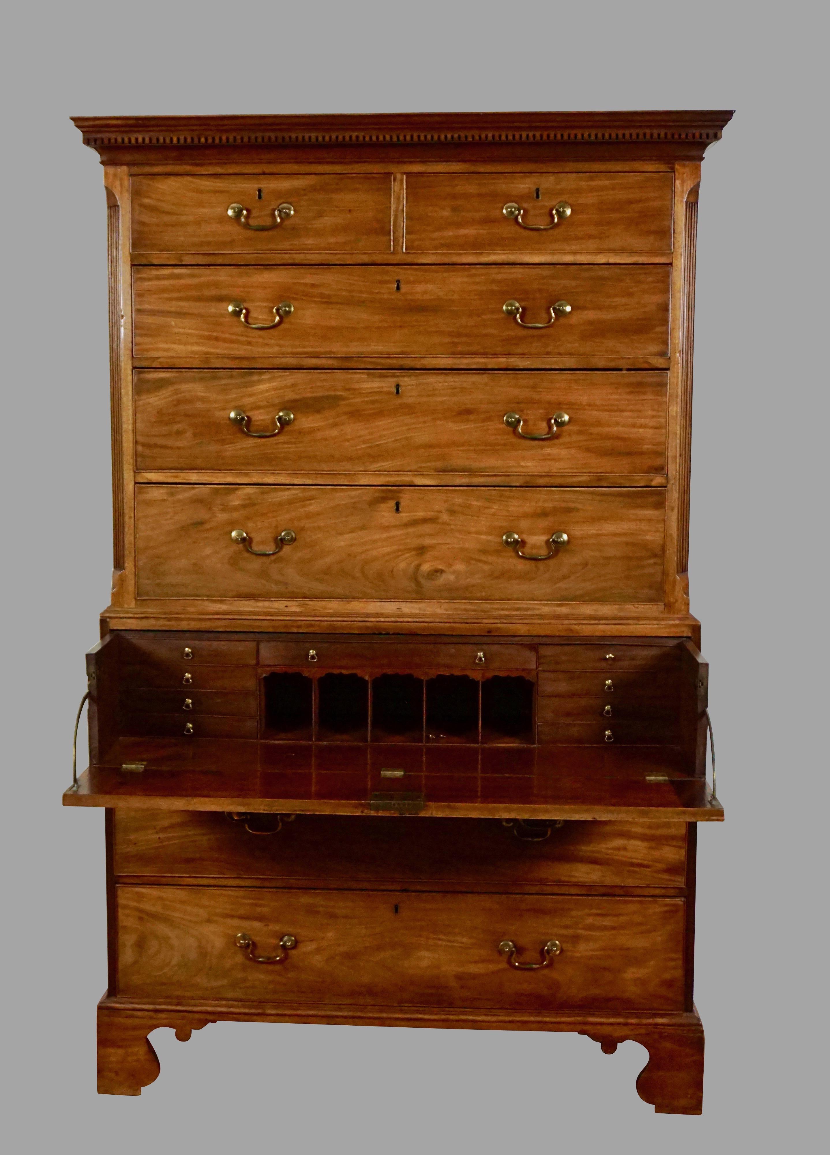 A good quality George III period mahogany chest-on-chest with secretaire, the upper stage with a dentil molded cornice over 2 short and 3 long drawers framed by reeded quarter columns. The lower stage has a well-fitted secretaire top drawer above 2