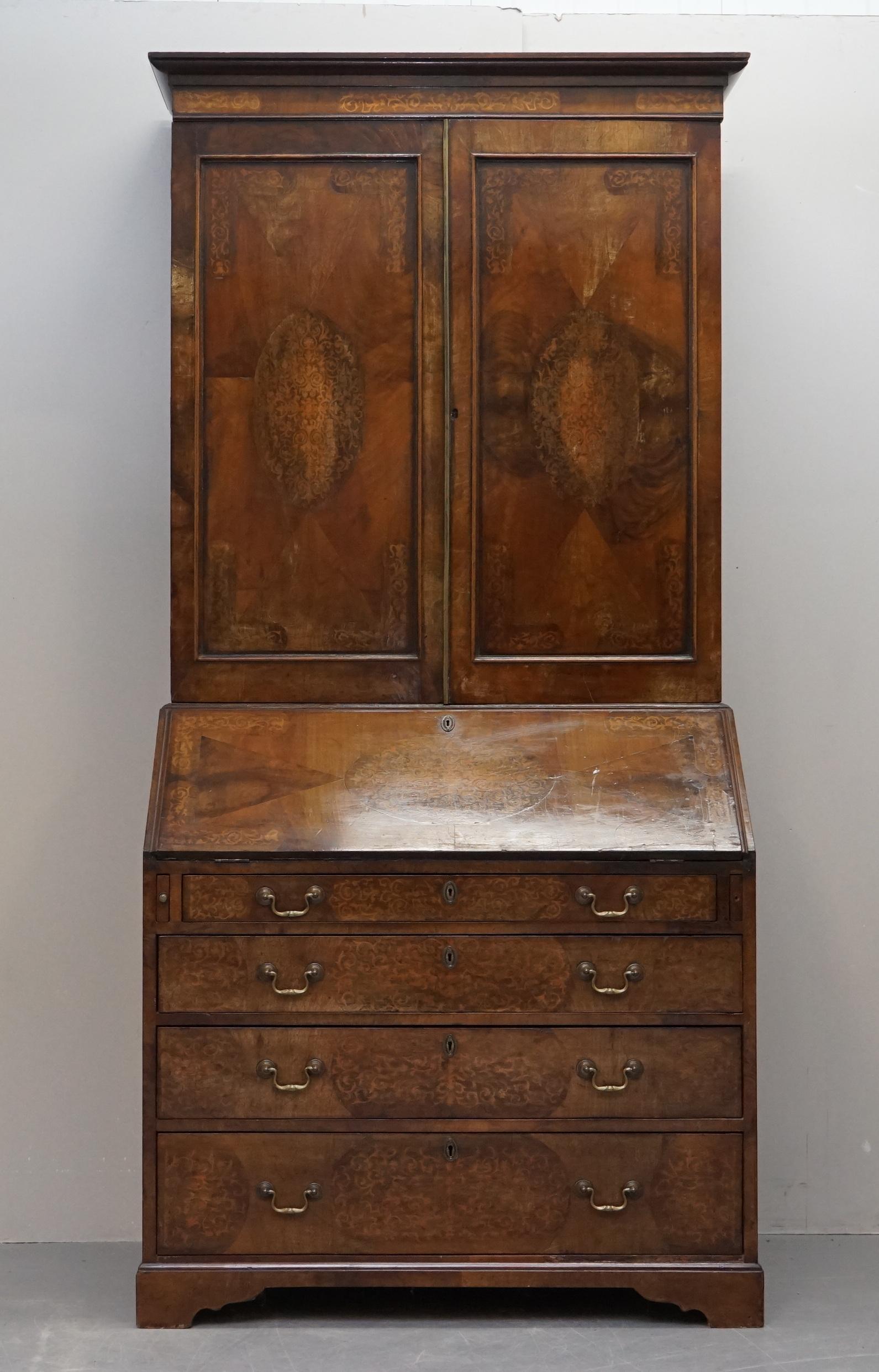 We are delighted to offer for sale this very nice hand made in England George III circa 1760-1780 Walnut & Seaweed Marquetry inlaid Bureau Library Bookcase

An extremely decorative and very fine antique. The timber patina is to die for, this