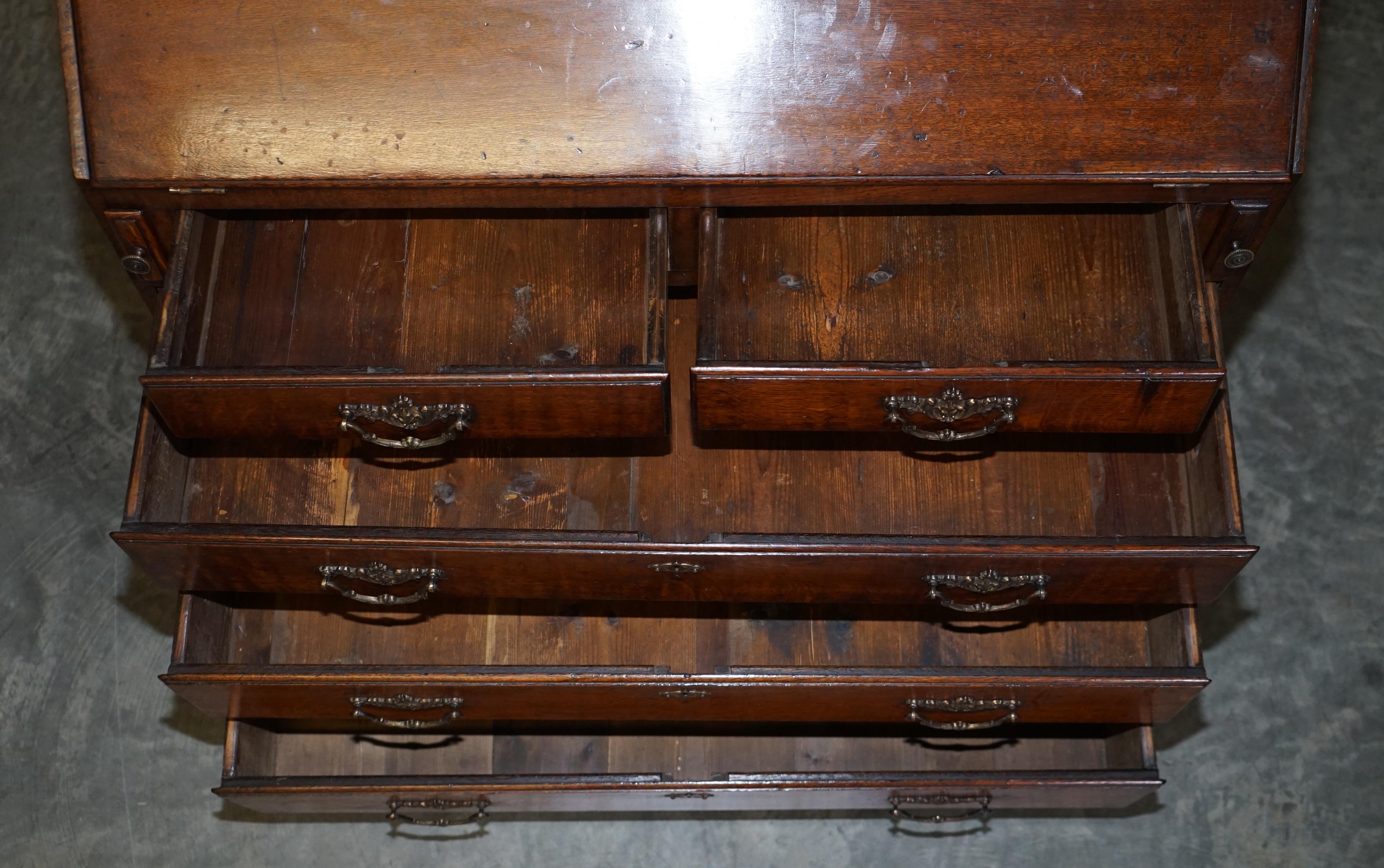George III circa 1760 English Oak Thomas Chippendale Carved Bureau Bookcase For Sale 16