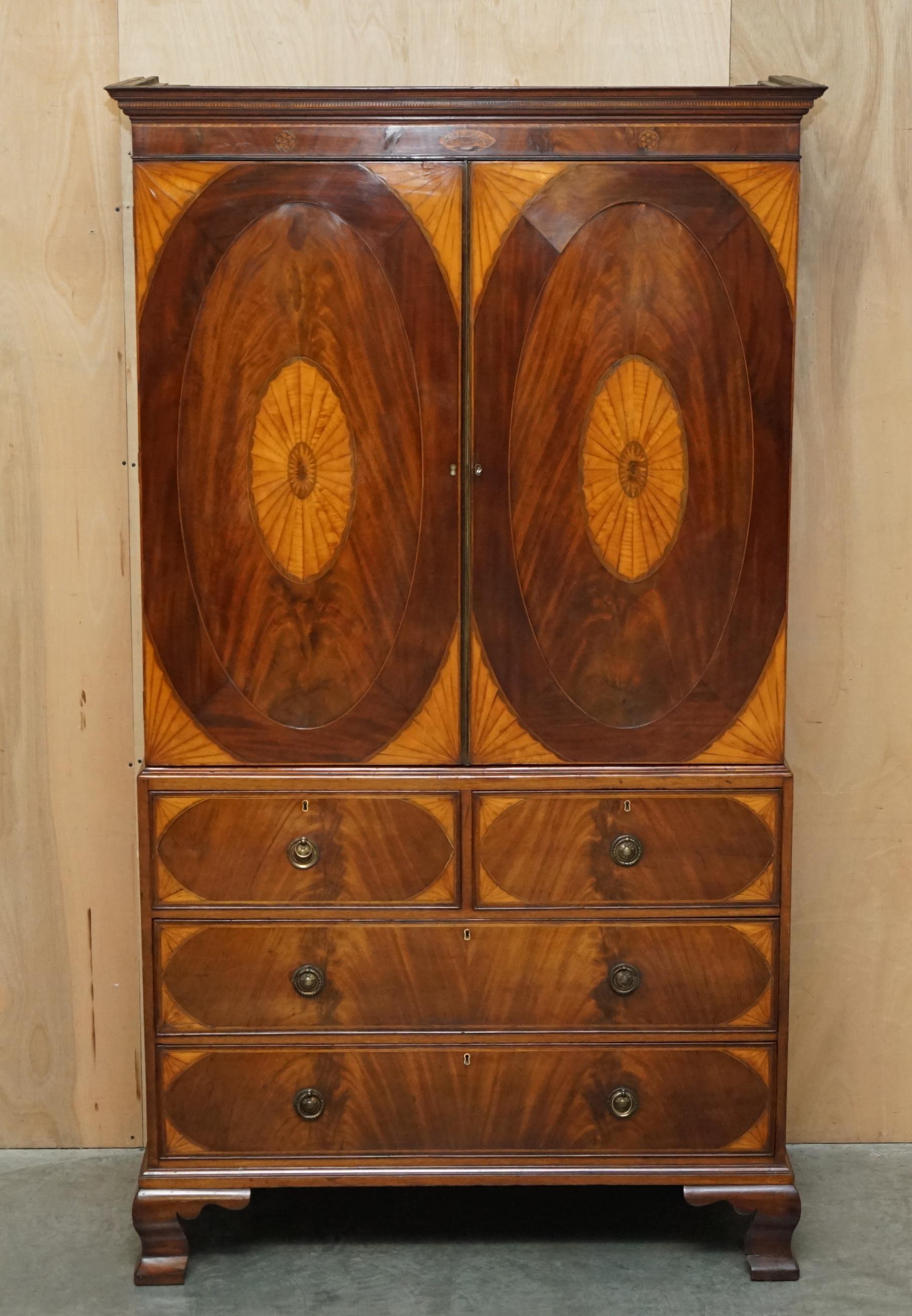 Royal House Antiques

Royal House Antiques is delighted to offer for sale this lovely original, fully restored George III Sheraton inlay circa 1760-1780 linen press wardrobe with two over two drawer base 

Please note the delivery fee listed is just