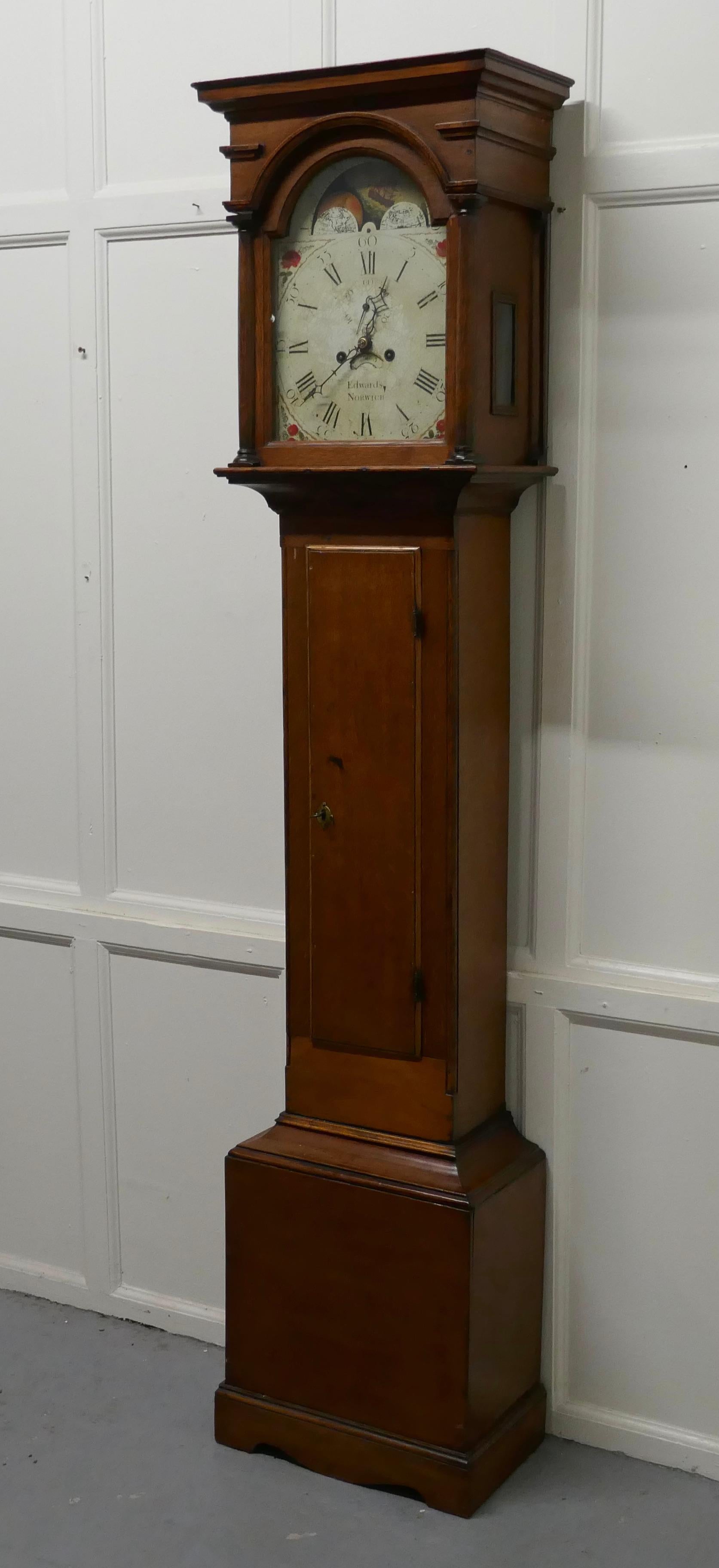George III Country oak long case clock by John Edwards of Norwich 

18th century Country oak clock with a painted enamel face, Arch Dial Rolling Moon phase with a separate seconds dial and date display by John Edwards of Norwich
 
Eight day