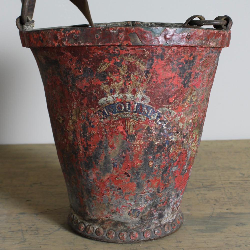 A beautifully patinated and wonderfully decorative, George III, original painted leather fire bucket, dating from the early 19th century.
English first half of the 19th century.