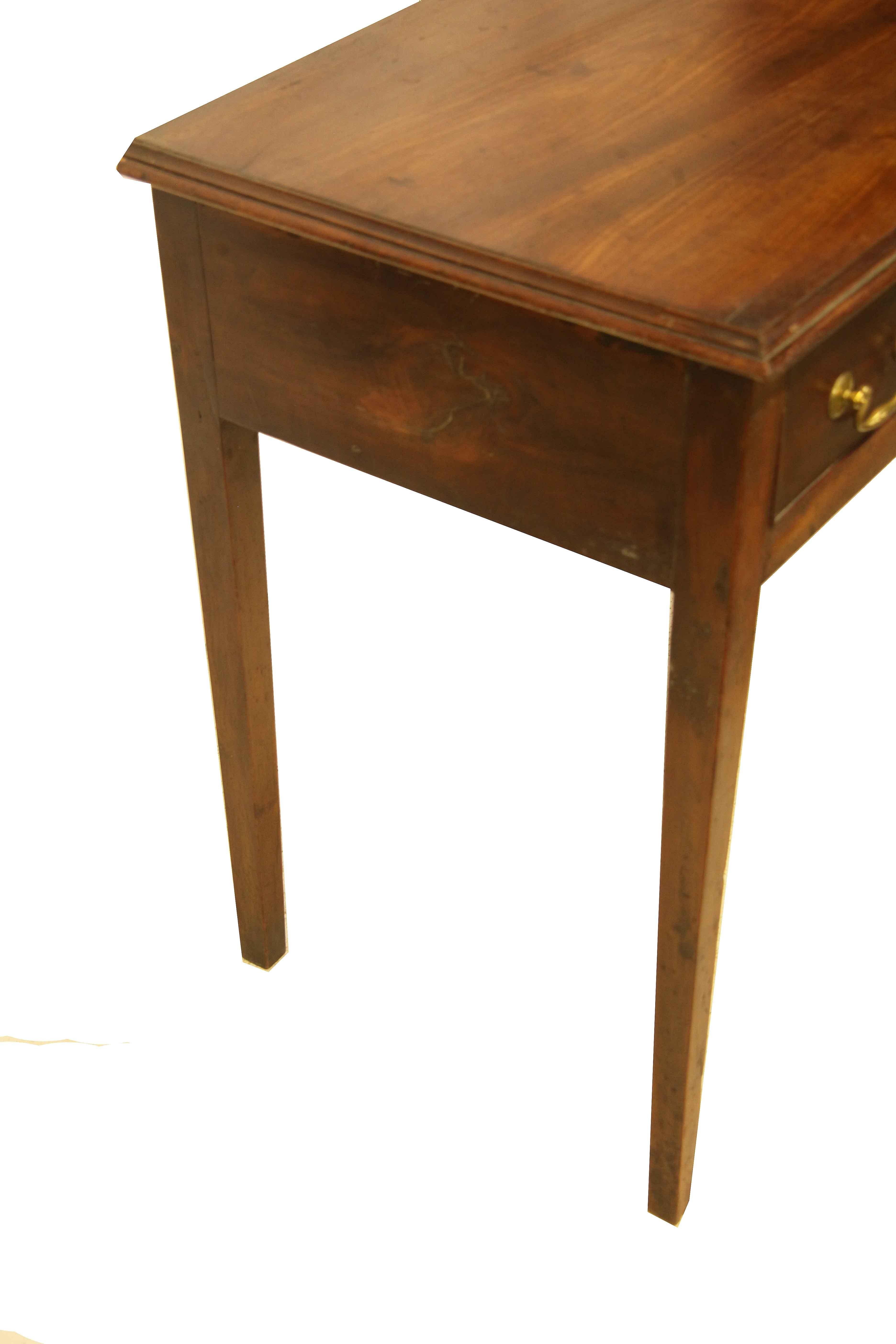 George III end table, the top has beautiful patina and grain with applied molding on the edge, single drawer with swan neck brass pulls, pine secondary wood. The legs are nicely tapered. This early 19th century table has excellent weight for its