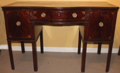 George III English Mahogany Serpentine Sideboard with Quarter Fan Inlay