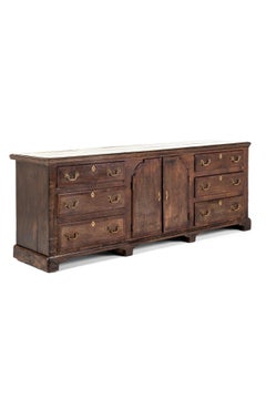 George III English Oak and Walnut Dresser Base With An Arrangement Of Six Drawer