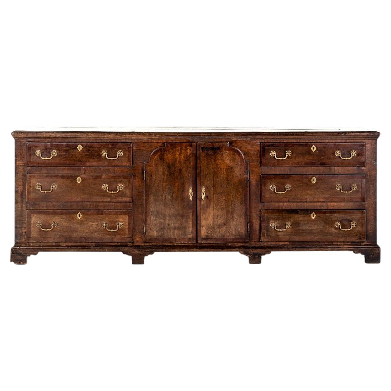 George III English Oak and Walnut Dresser Base With An Arrangement Of Six Drawer