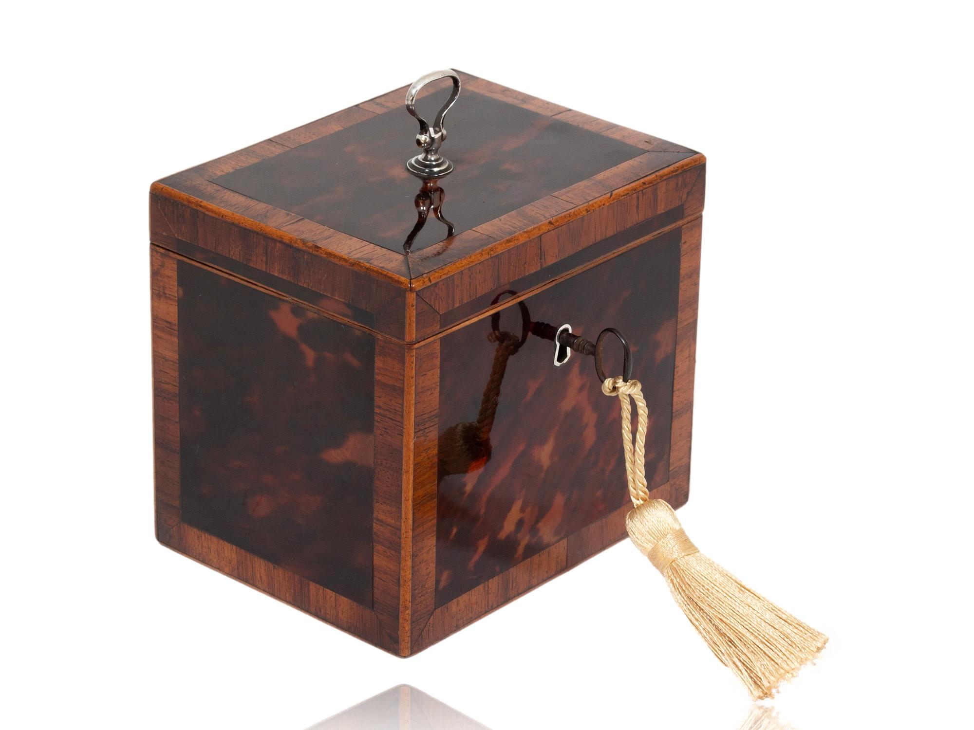 FREE WORLDWIDE SHIPPING

Georgian Tea Caddy Circa 1780

From our Tea Caddy collection, we are pleased to introduce this unusual wooden mounted red tortoiseshell tea caddy.

The tea caddy of square form edged in boxwood with tulip wood cross banding