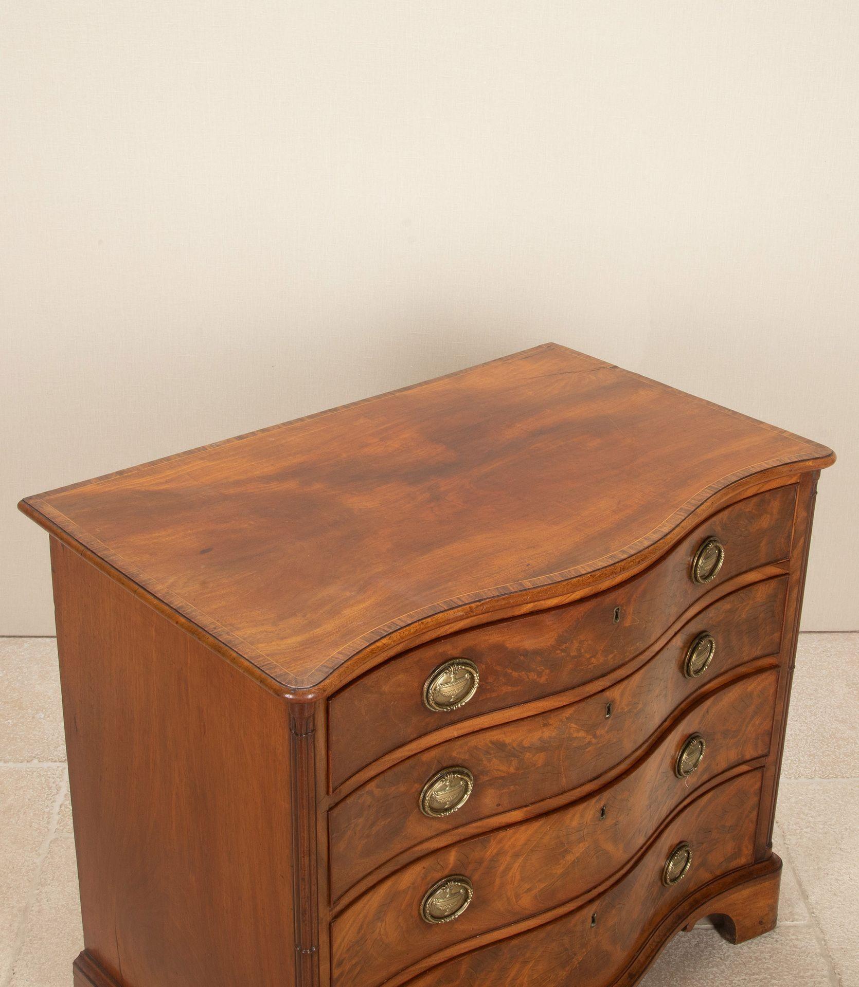 George III Figured Mahogany Serpentine Front Chest of Drawers For Sale 2