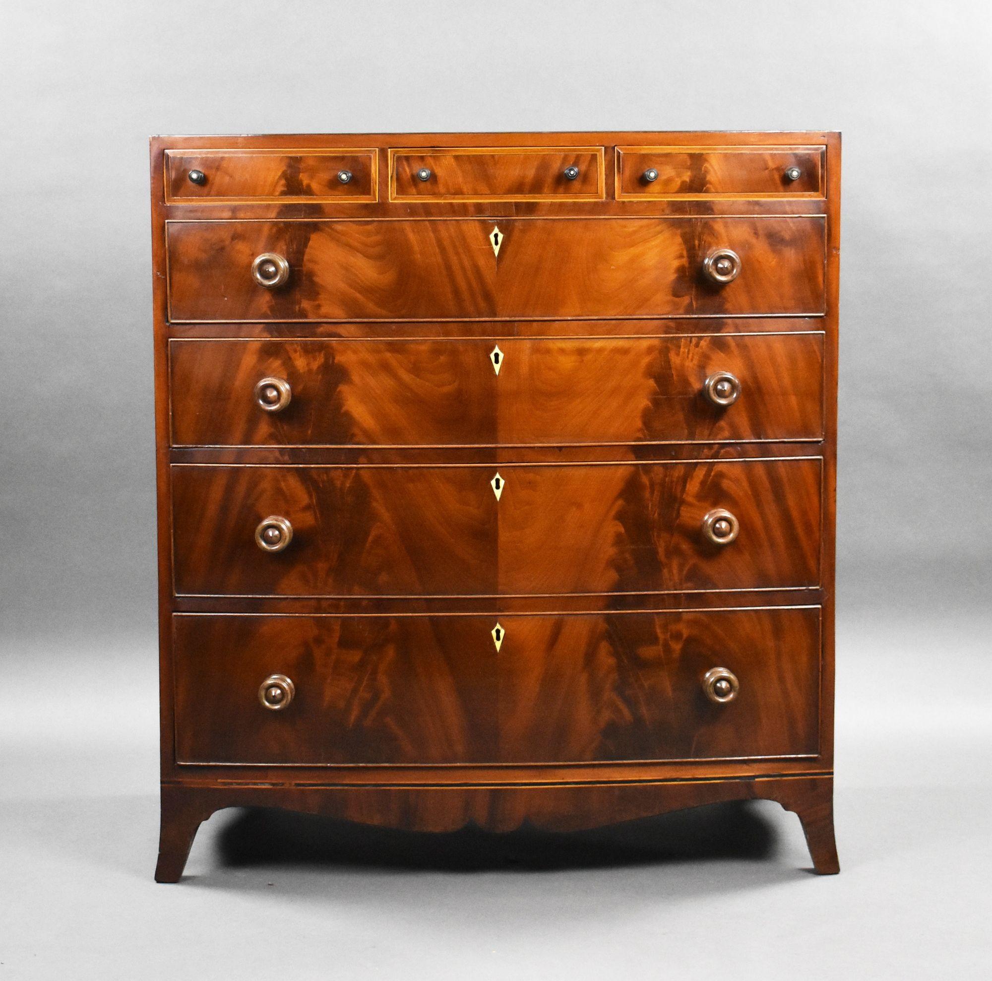 For sale is a very good quality George III flame mahogany bow front chest, the line inlaid caddy top, with three small drawers below, over three long graduated drawers, all with turned handles and flame mahogany drawer fronts, raised on splayed