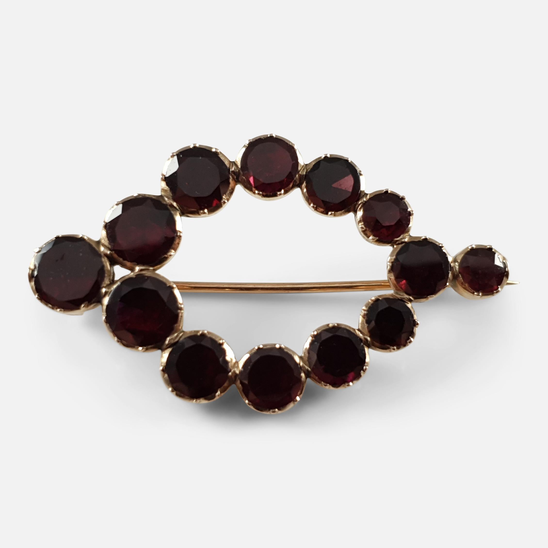 Item: - This is a beautiful antique Georgian gold & Almandine garnet brooch - circa 1800. The brooch is set with the finest graduating foiled back almandine garnet gemstones. As was common for the period the brooch is unhallmarked, and has been